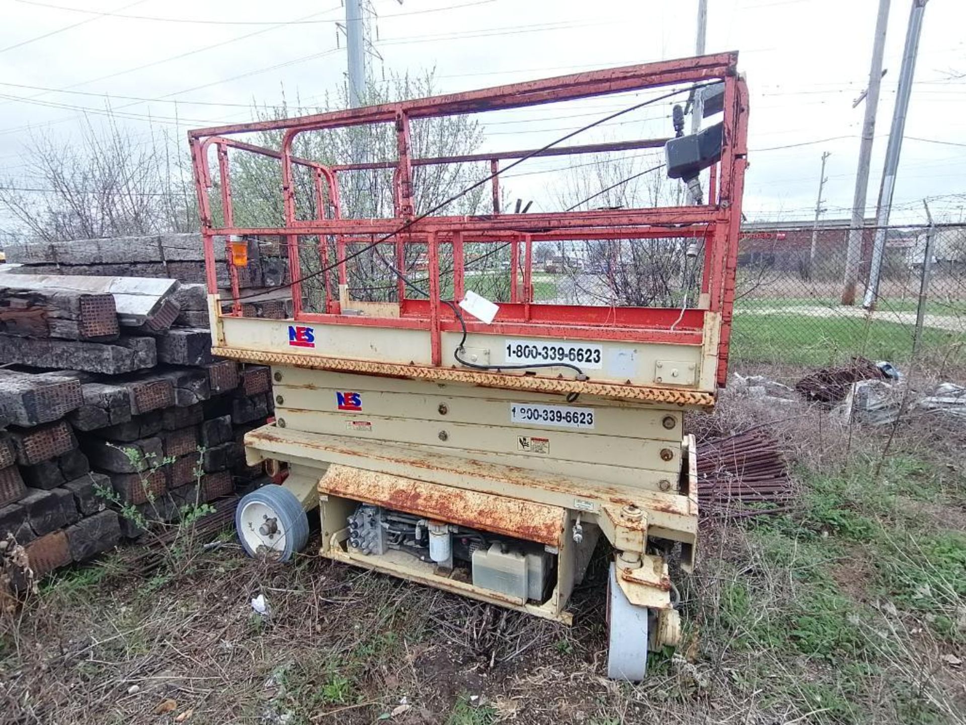 (1) JLG 2646-E Scissor Lift, Need Batteries. Located in Waukegan, IL.