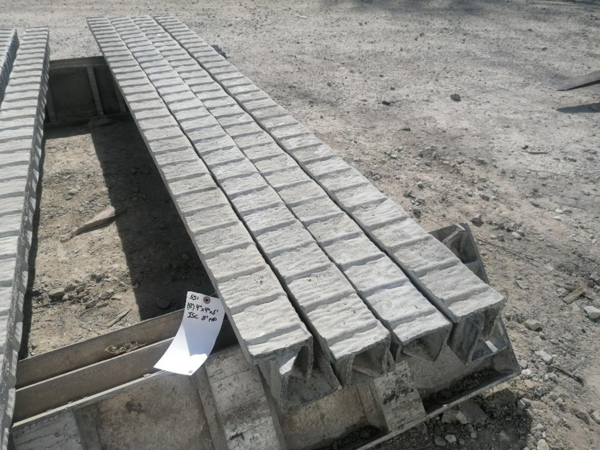 (8) 4" x 4" x 8' ISC Wall-Ties Textured Brick Aluminum Concrete Forms 8" Hole Pattern. Located in