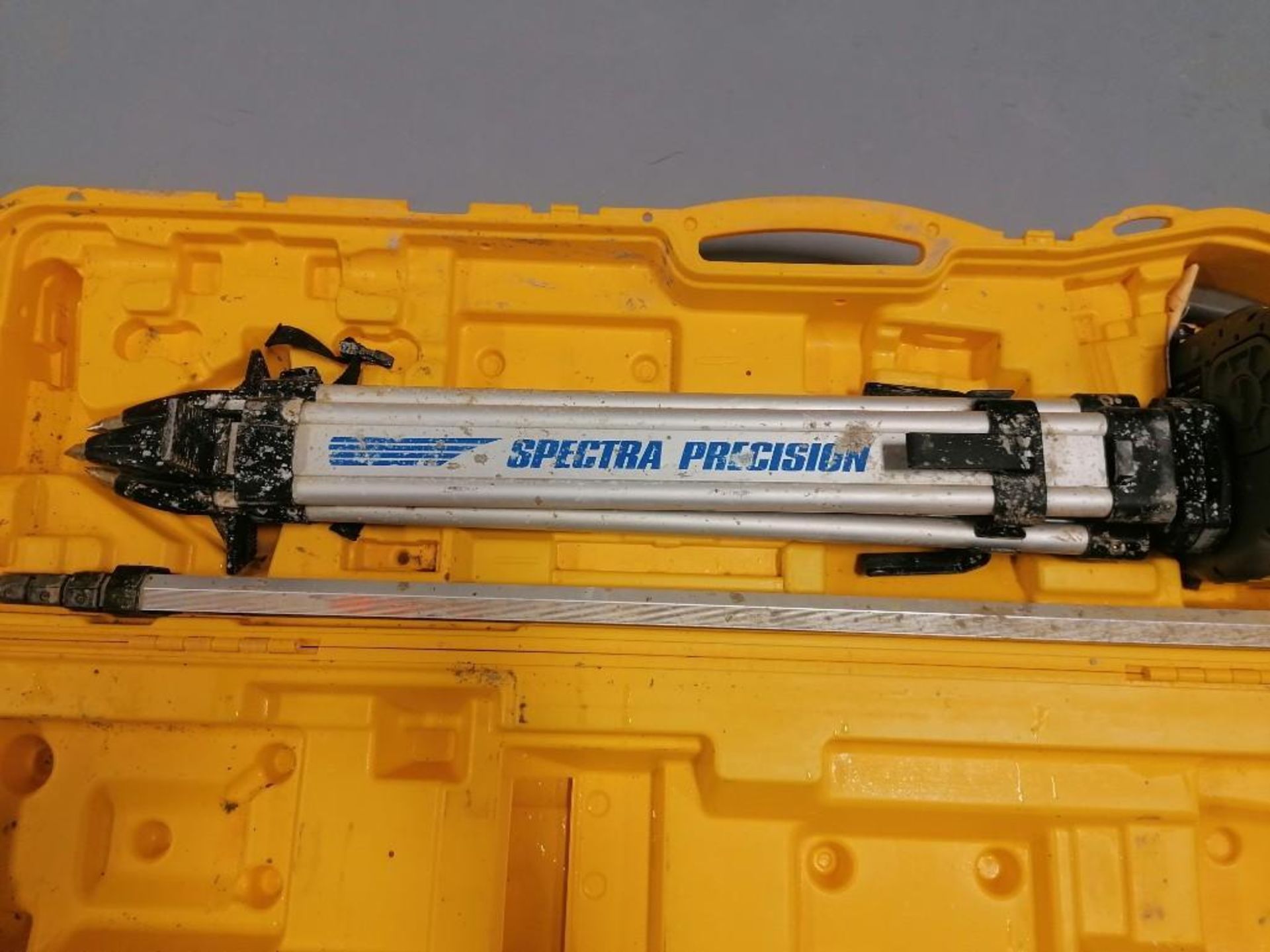 (1) Spectra Precision Laser, Model LL300N, Serial #17469915 with Grade Rods & Tripod . Located in - Image 2 of 6