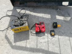 (1) AMICA Automatic Battery Charger, (1) Milwaukee Charger & (2) DeWalt Batteries. Located in Mt.