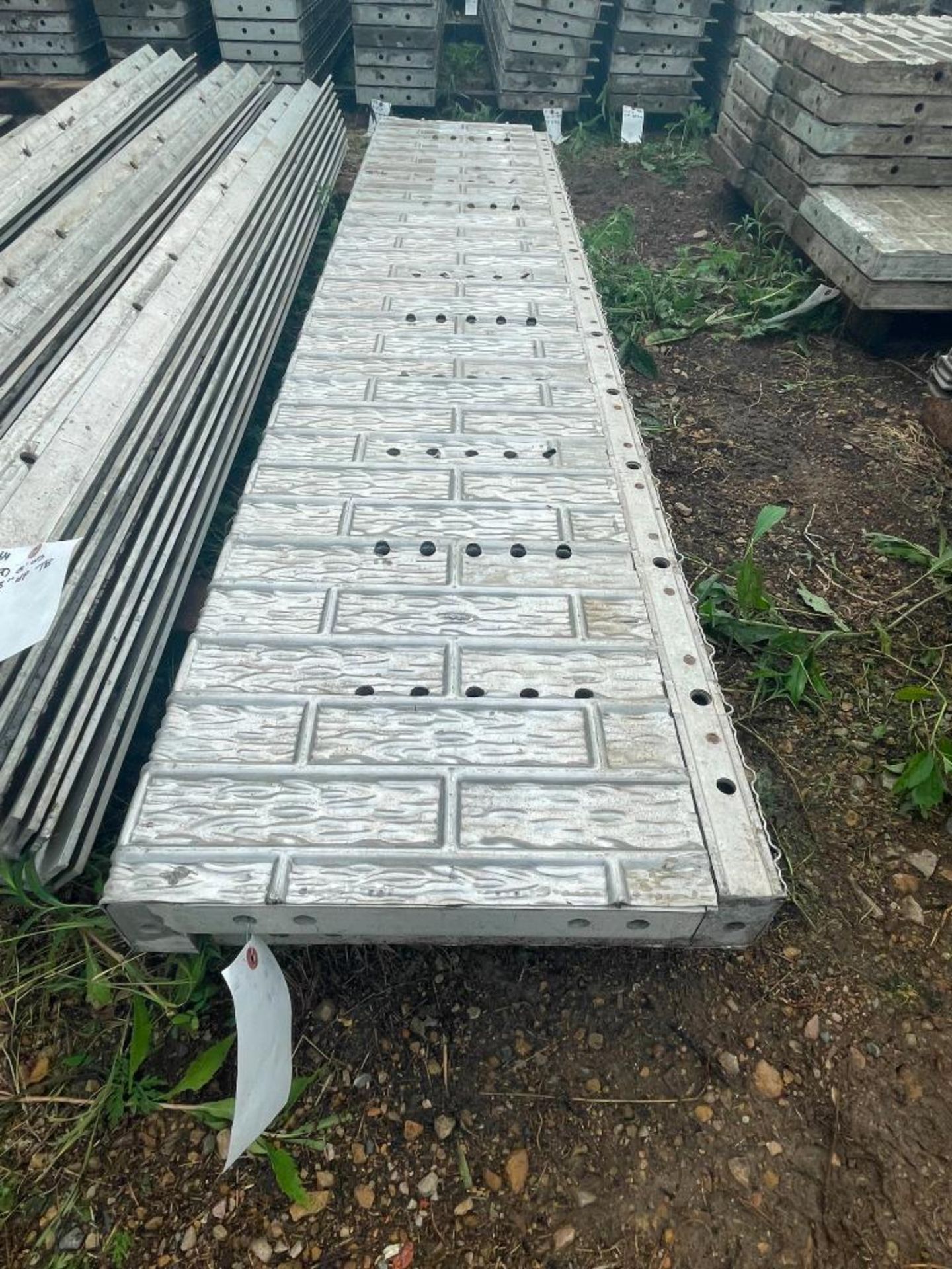 (2) 18" x 8' with 2" Ledge Wall-Ties Textured Brick Aluminum Concrete Forms 8" Hole Pattern. Located