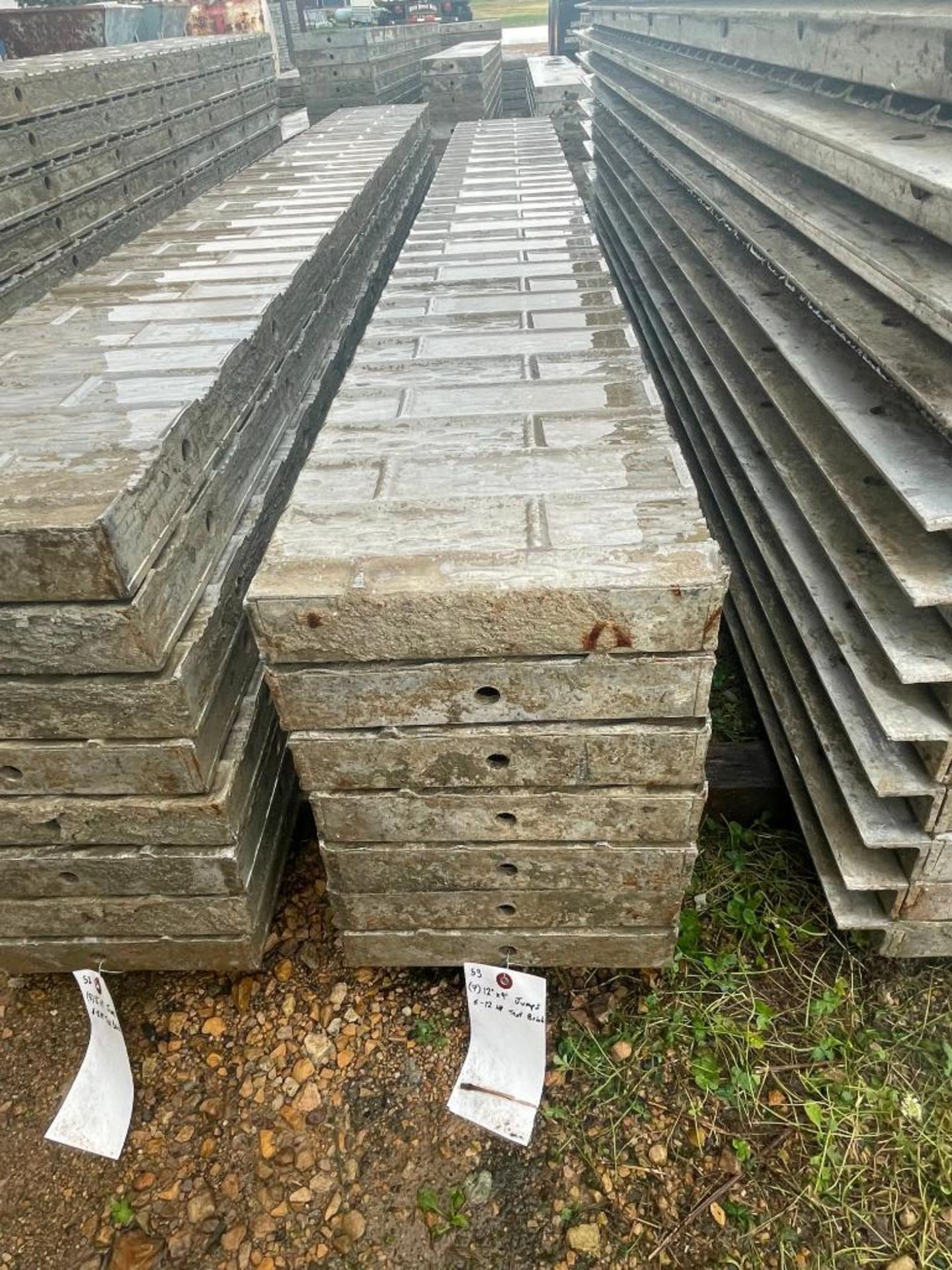 (7) 12" x 9' Corners Wall-Ties Textured Brick Aluminum Concrete Forms 6-12 Hole Pattern. Located in