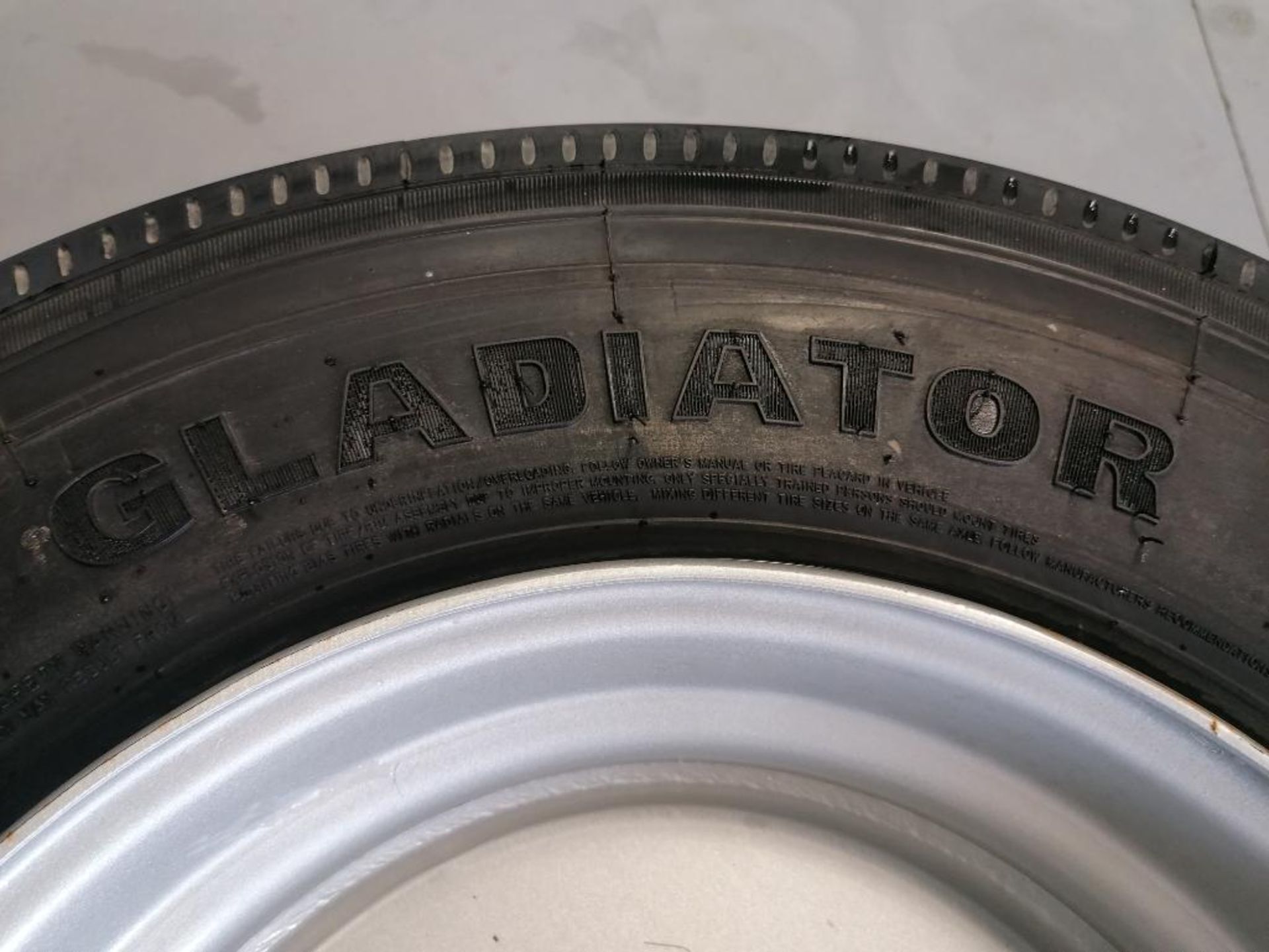 (4) Gladiator QR55T 235/75R17.5 Tires with 8 Bolt Pattern 6" Center Rims. Located in Mt. Pleasant, I - Image 6 of 8