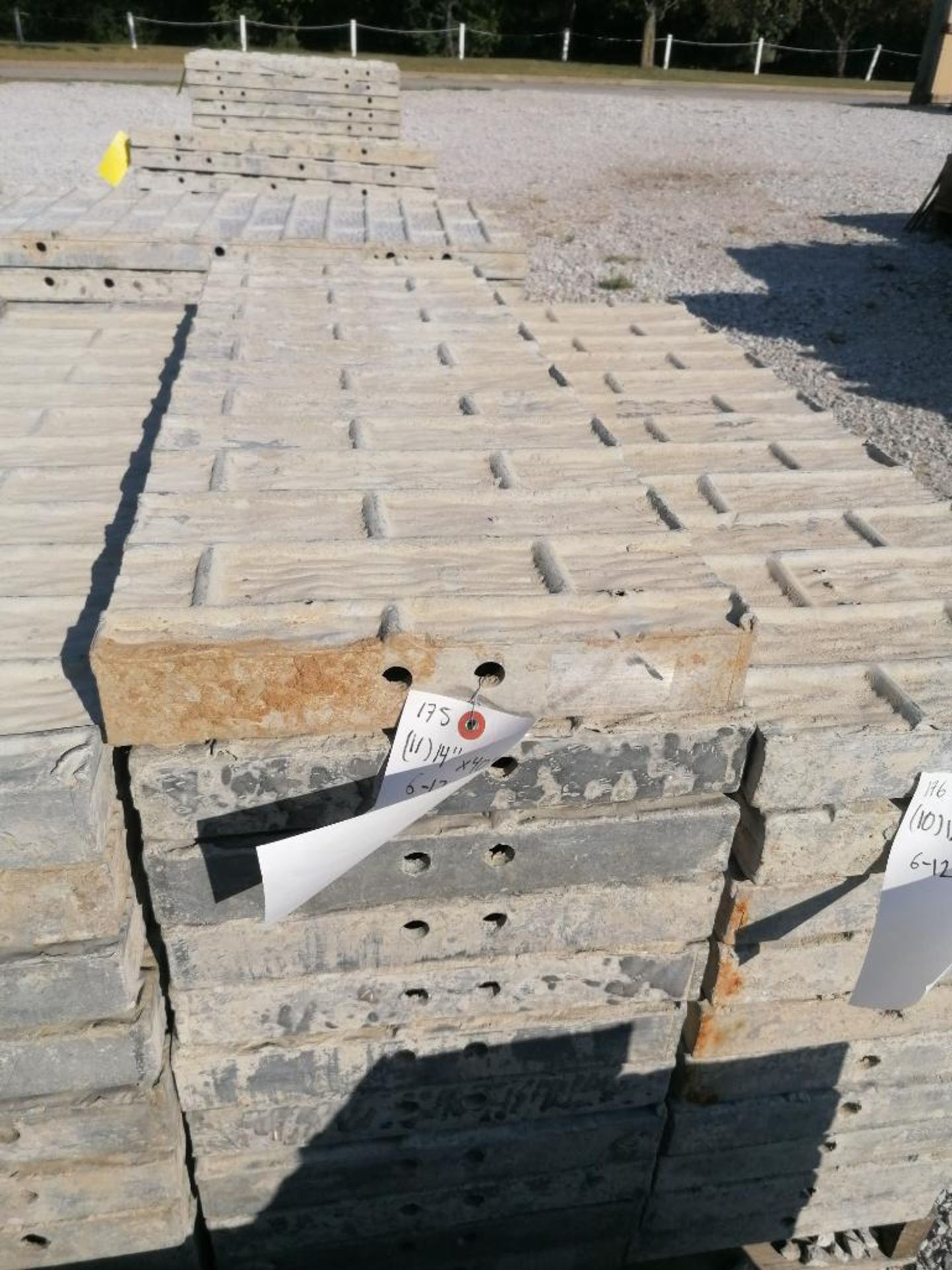 (11) 14" x 40" TUF-N-LITE Textured Brick Aluminum Concrete Forms 6-12 Hole Pattern. Located in