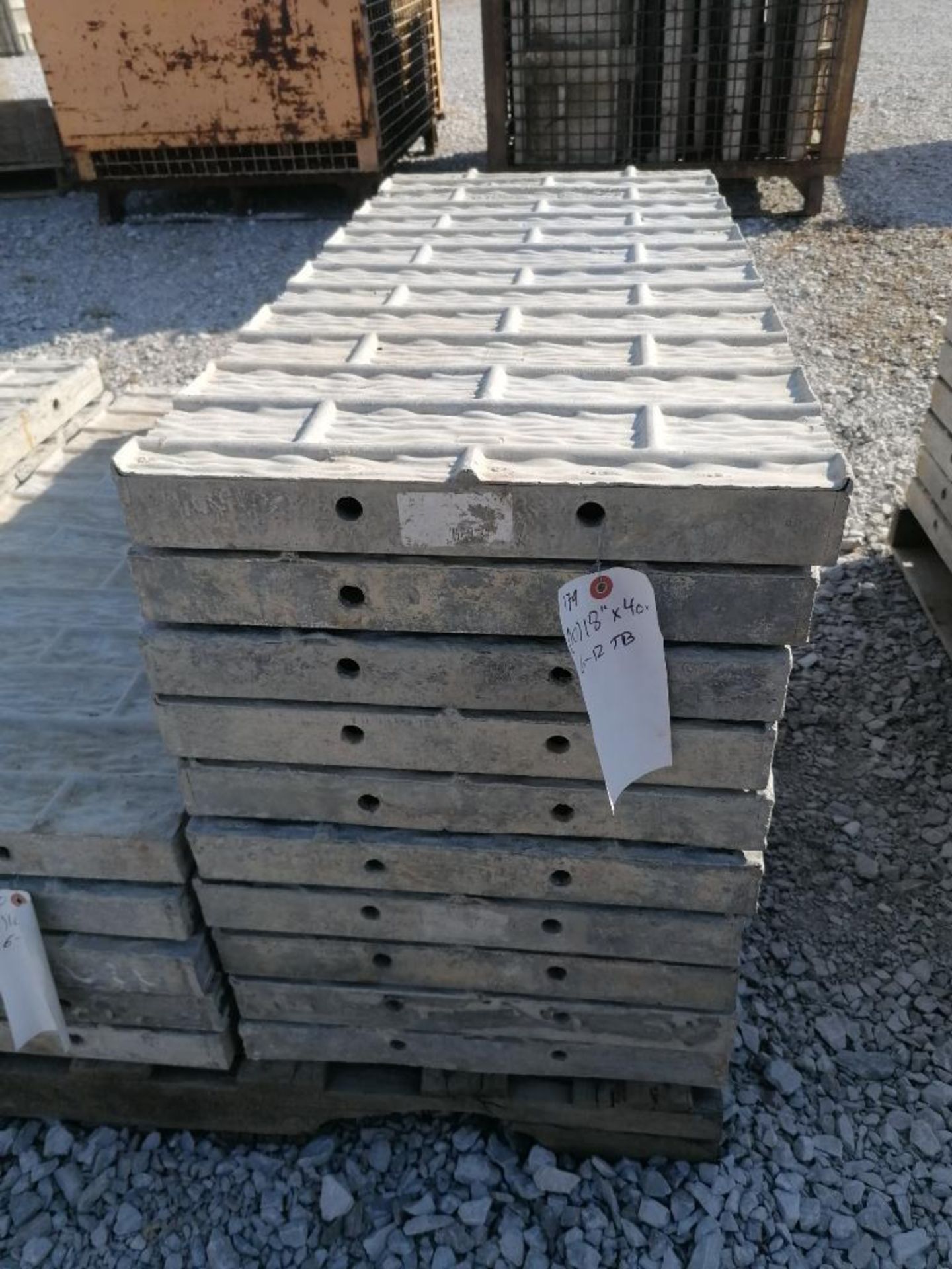 (10) 18" x 40" TUF-N-LITE Textured Brick Aluminum Concrete Forms 6-12 Hole Pattern. Located in