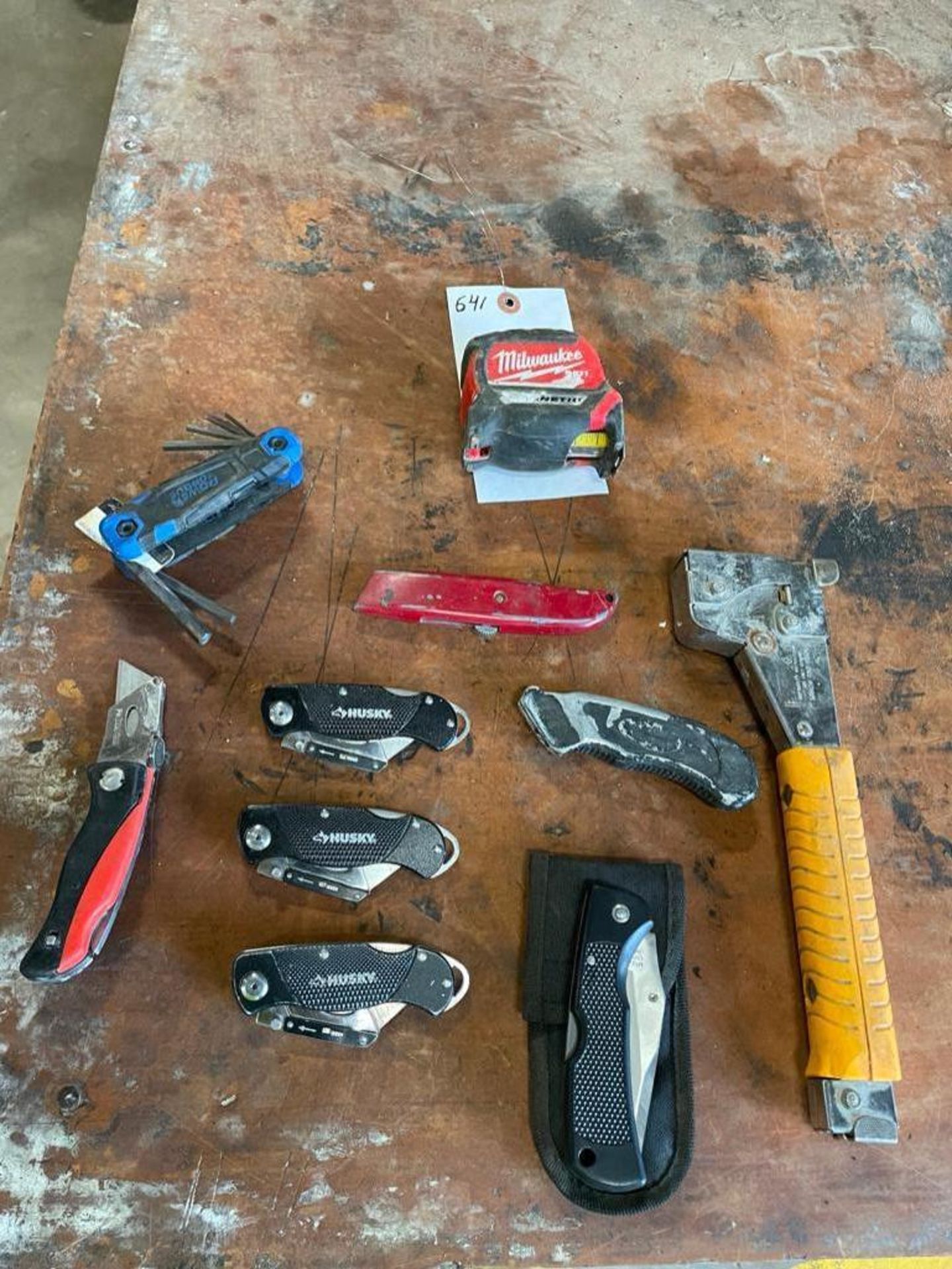 Miscellaneous Cutting Knifes, Staple Gun, Tape Measure & Folding Hexagon Key. Located in Hazelwood,