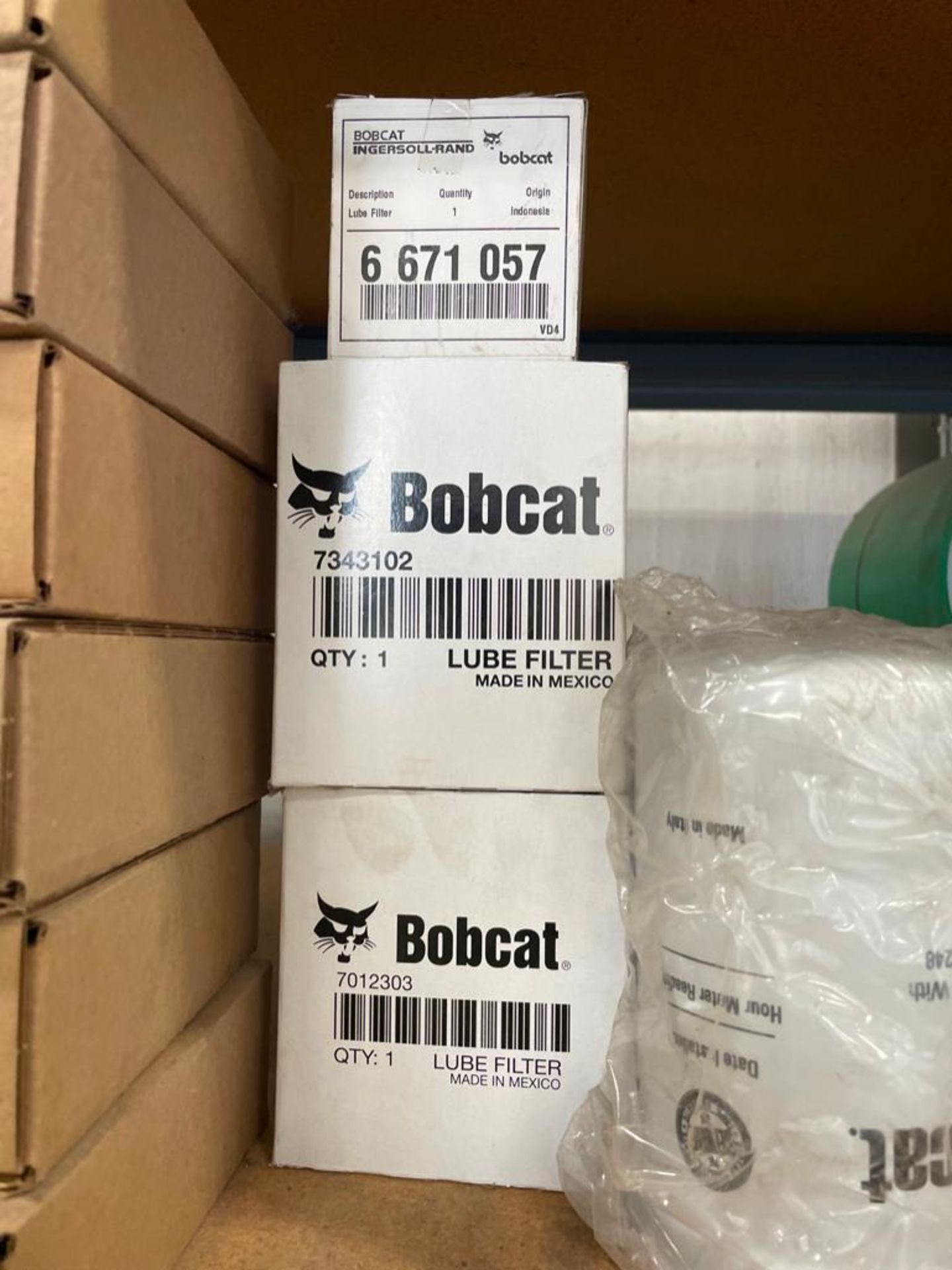 Two Shelves of Miscellaneous New Bobcat Parts, Oil Filter, Hyd Filter, Lube Filter, Air Filter, Hose - Image 12 of 13