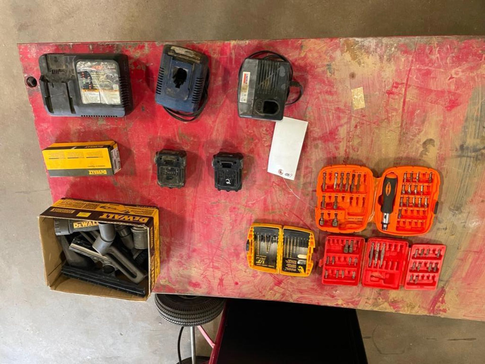 Miscellaneous DeWalt parts, chargers, bits, etc. Located in Hazelwood, MO