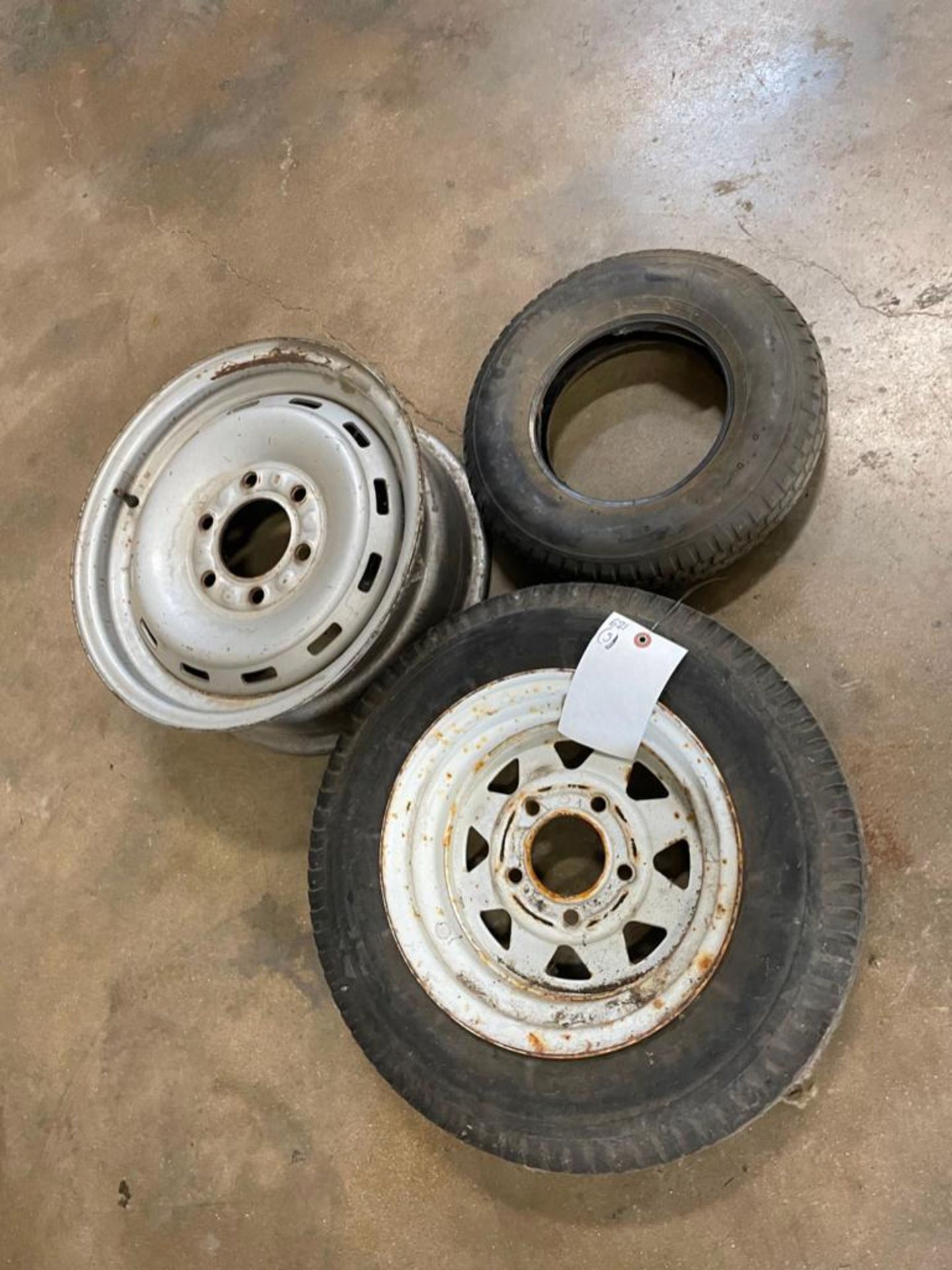 Tire 4.80/4.00-8, 6 Bolt Rim & Tire 5.30-12 with 5 Bolt Rim. Located in Hazelwood, MO