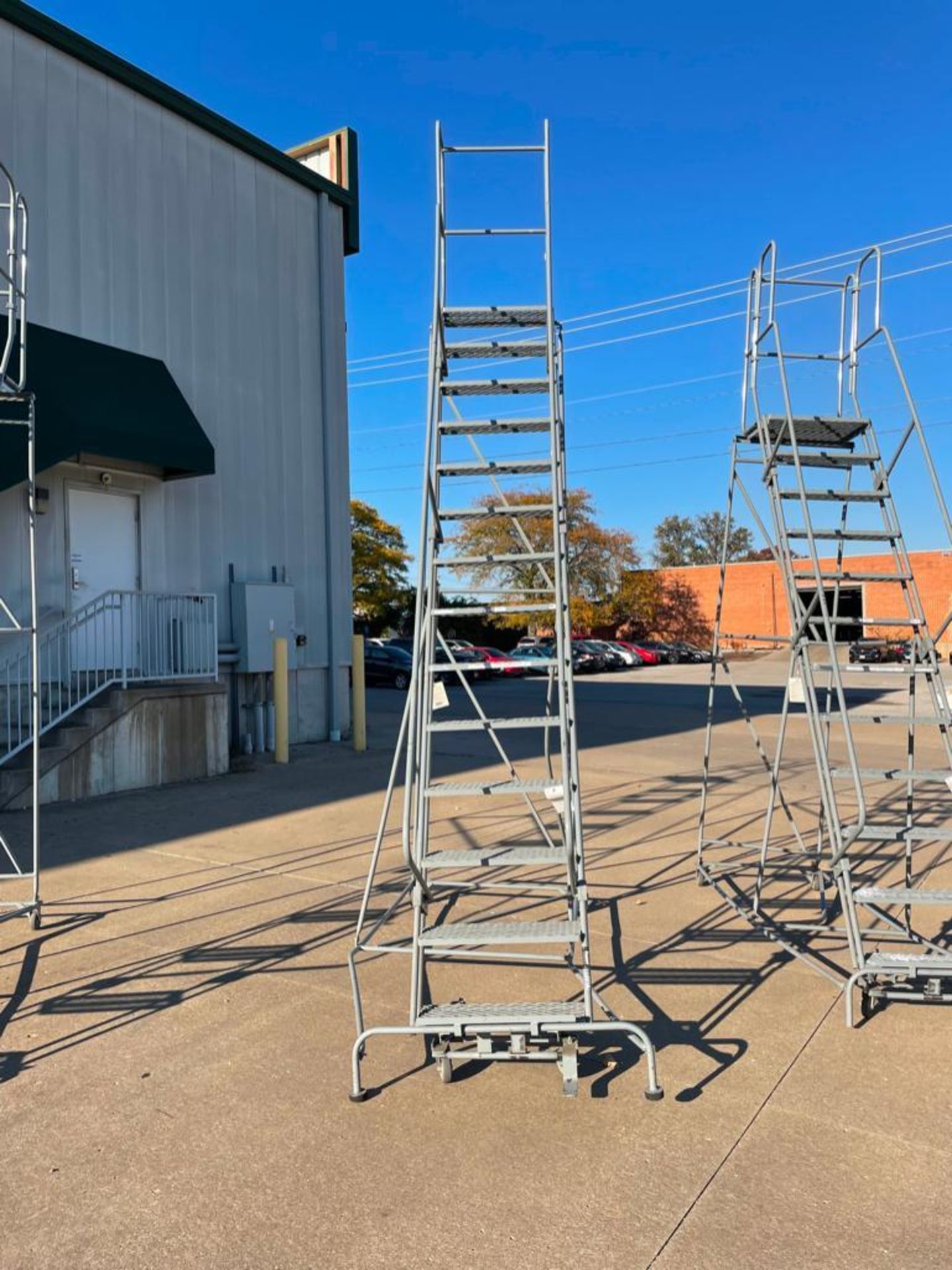 14 Step Rolling Platform Ladder. Located in Hazelwood, MO - Image 2 of 4