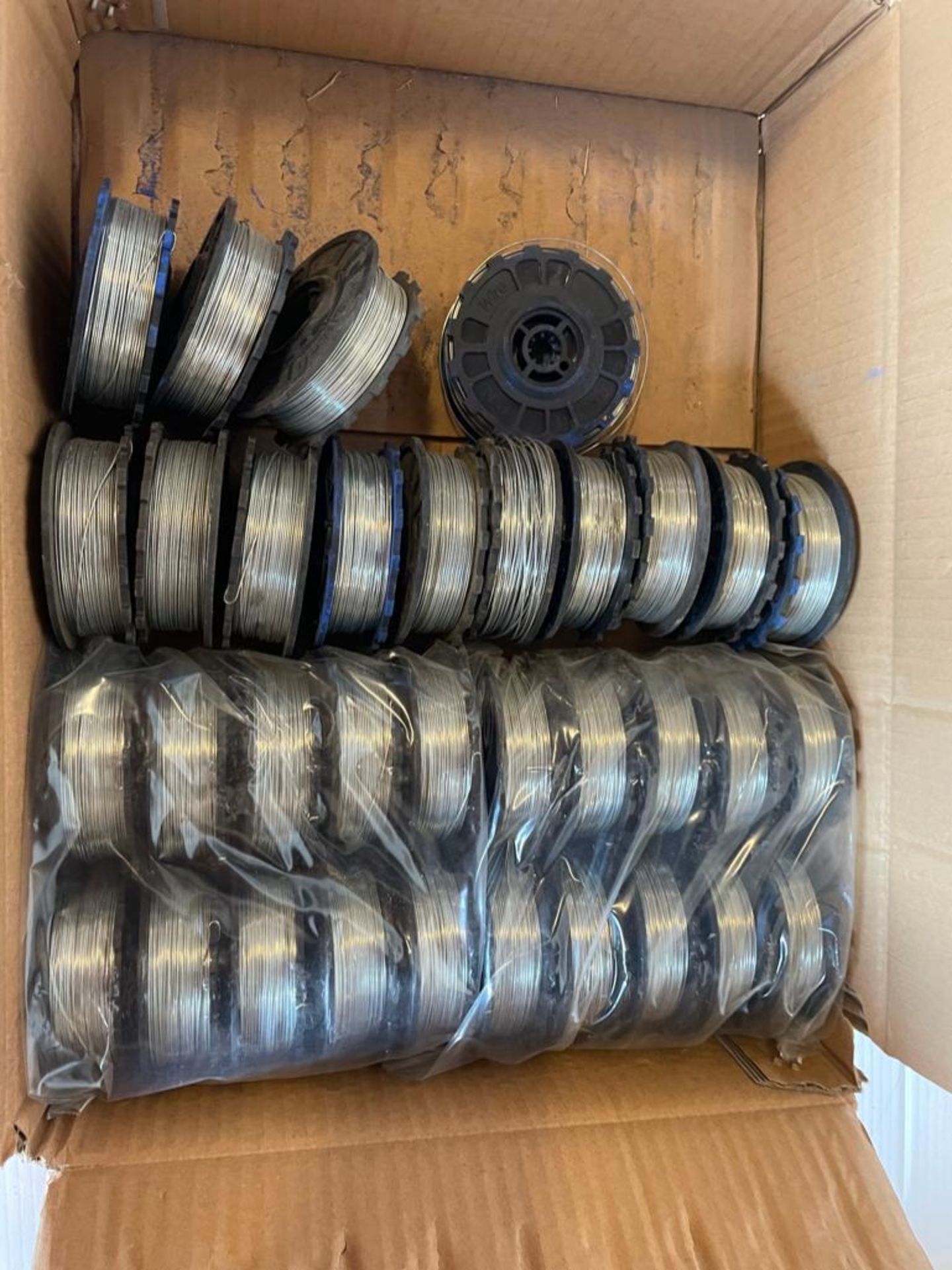 (34) Rolls of 50 Wire Coils for BNT-40 Cordless Rebar Tying Tool. Located in Hazelwood, MO