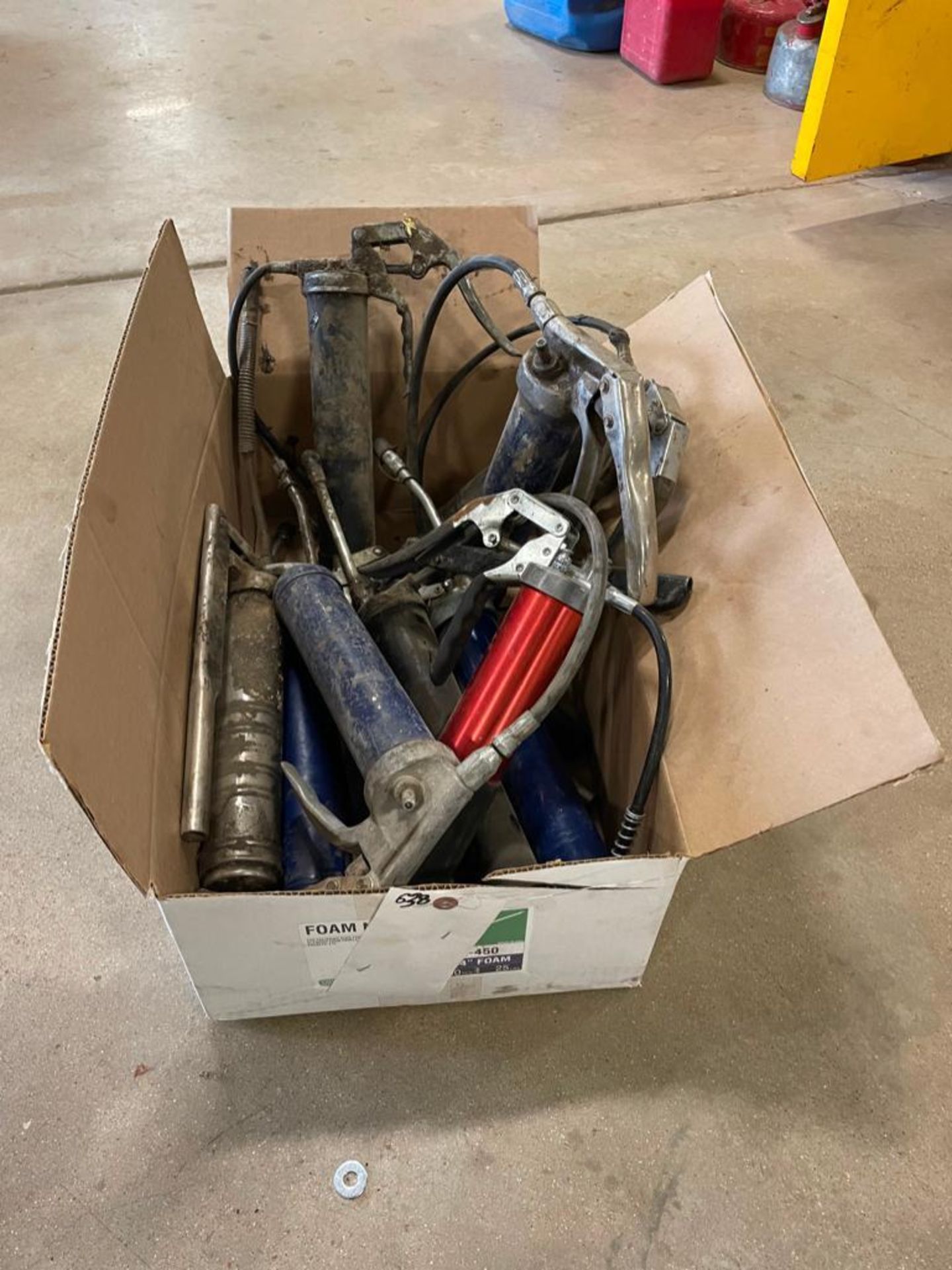 Box of Miscellaneous Grease Guns. Located in Hazelwood, MO