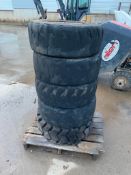 Pallet of (5) Bobcat Skid Steer Foam Filled Tires & 8 Bolt Bobcat Rims. Located in Hazelwood, MO