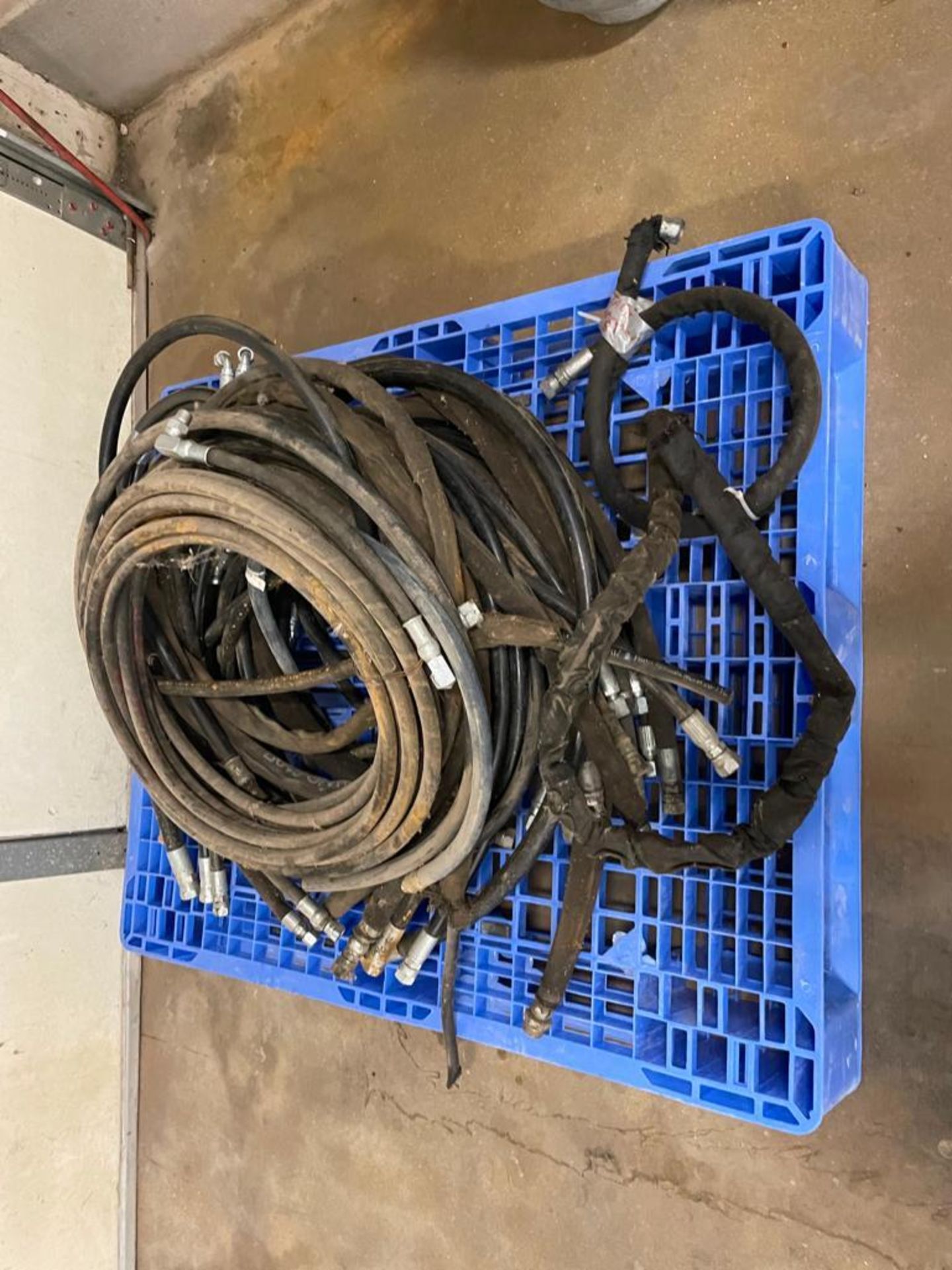 Pallet of Bobcat Hydraulic Hoses. Located in Hazelwood, MO