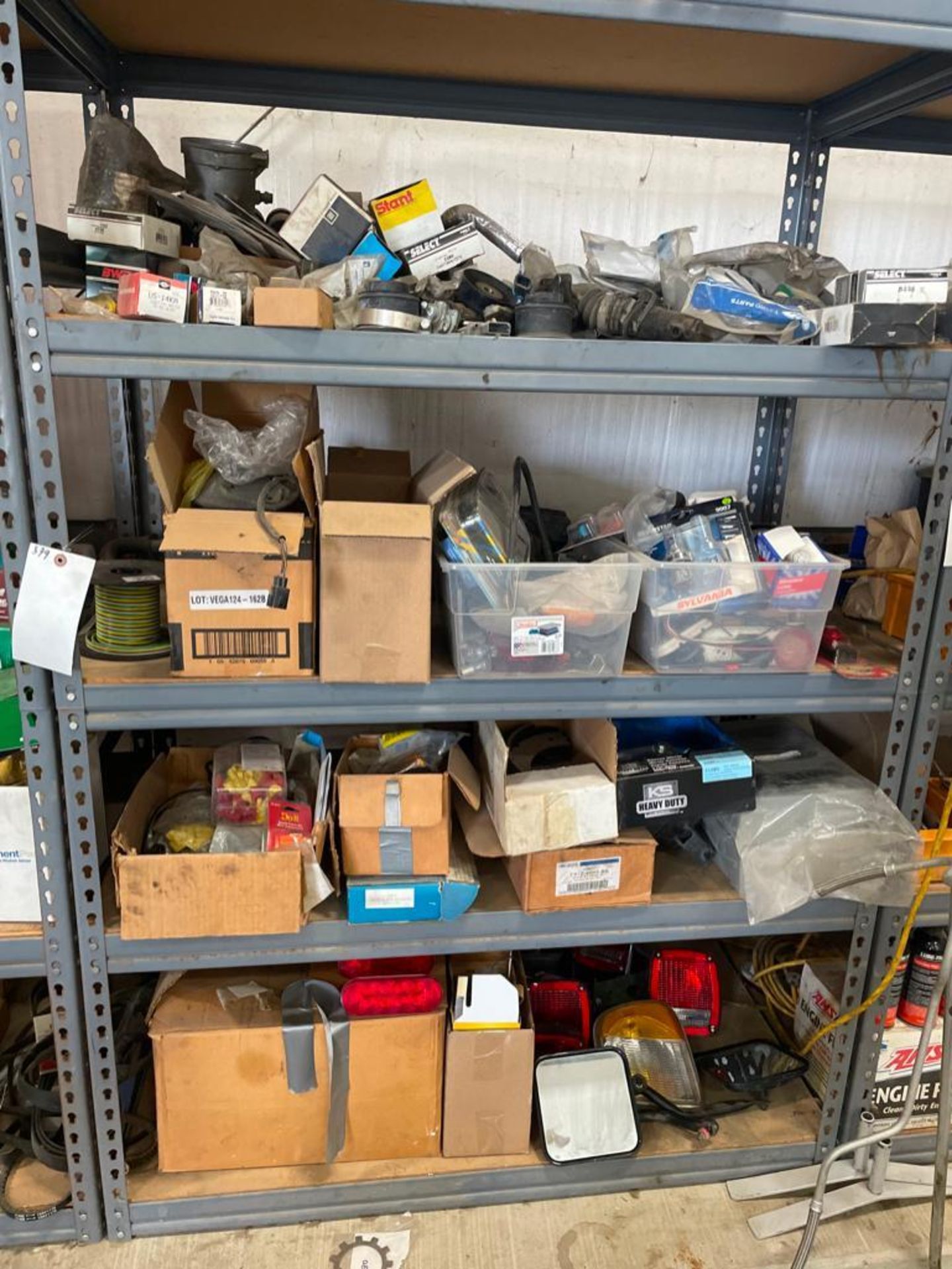 Miscellaneous Parts on Shelving Unit, Tail Lights, Connectors, Light Box Triple, Etc. Located in Ha