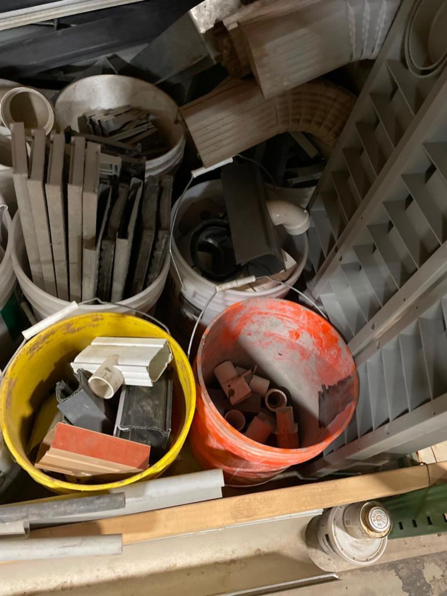 Miscellaneous Contents of Shelf, Elbows, PVC Pipe, Wire Conduit, Clamps, Gutter Elbows, Etc. Located - Image 8 of 10