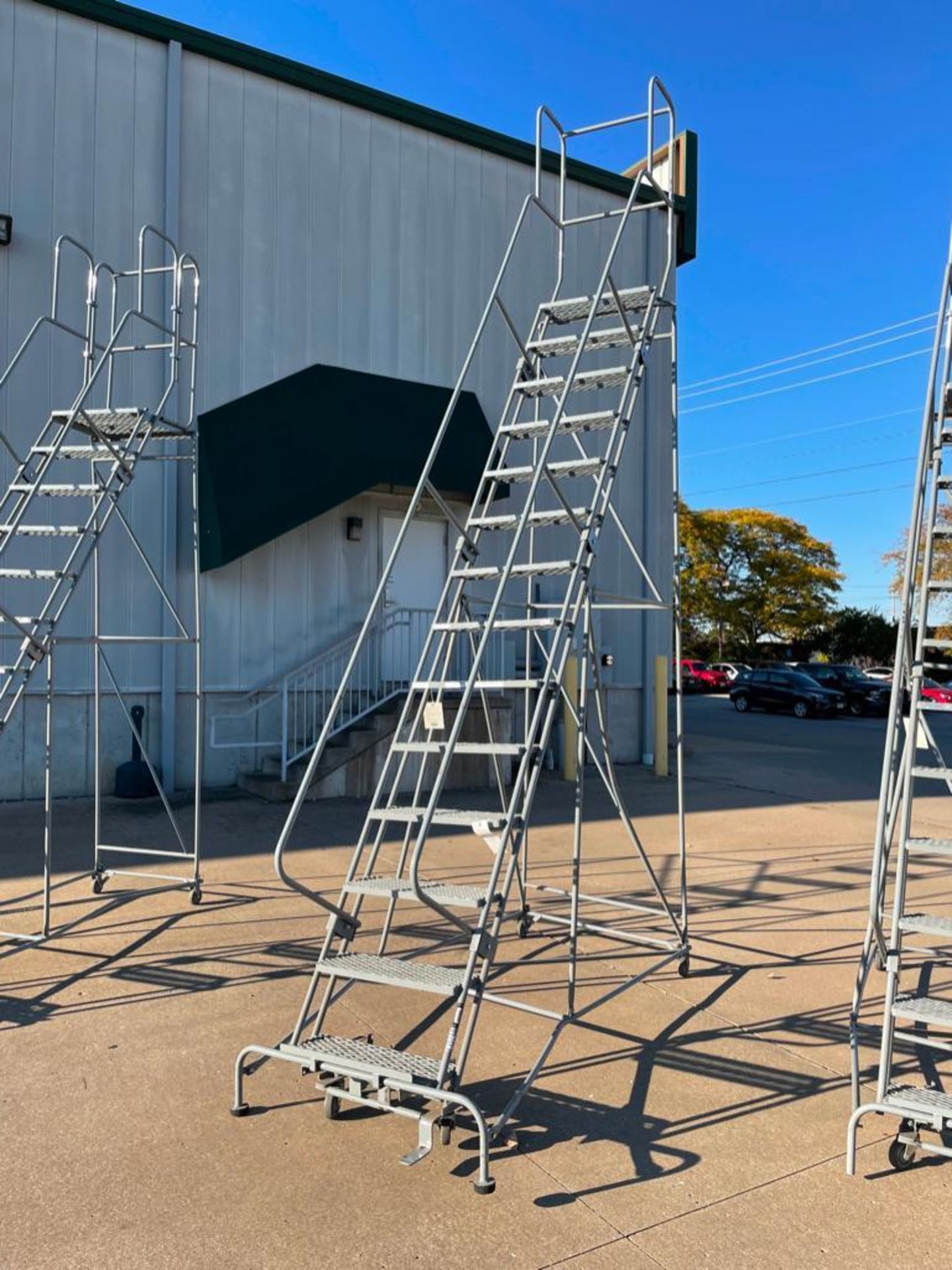 14 Step Rolling Platform Ladder. Located in Hazelwood, MO