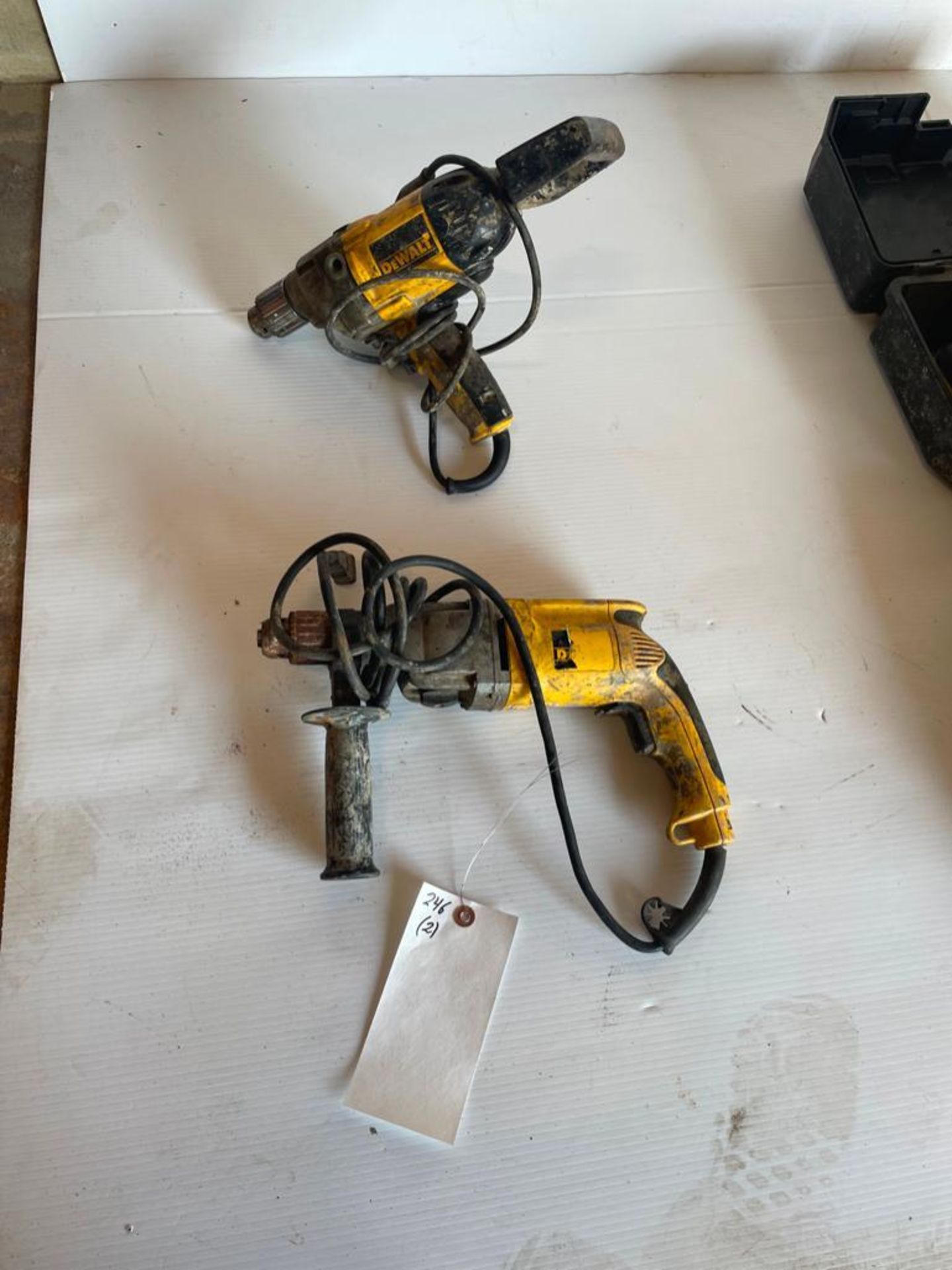 (2) DeWalt Drills, DW515 VSR Hammer Drill & DW130V Keyed Corded Drill. Located in Hazelwood, MO