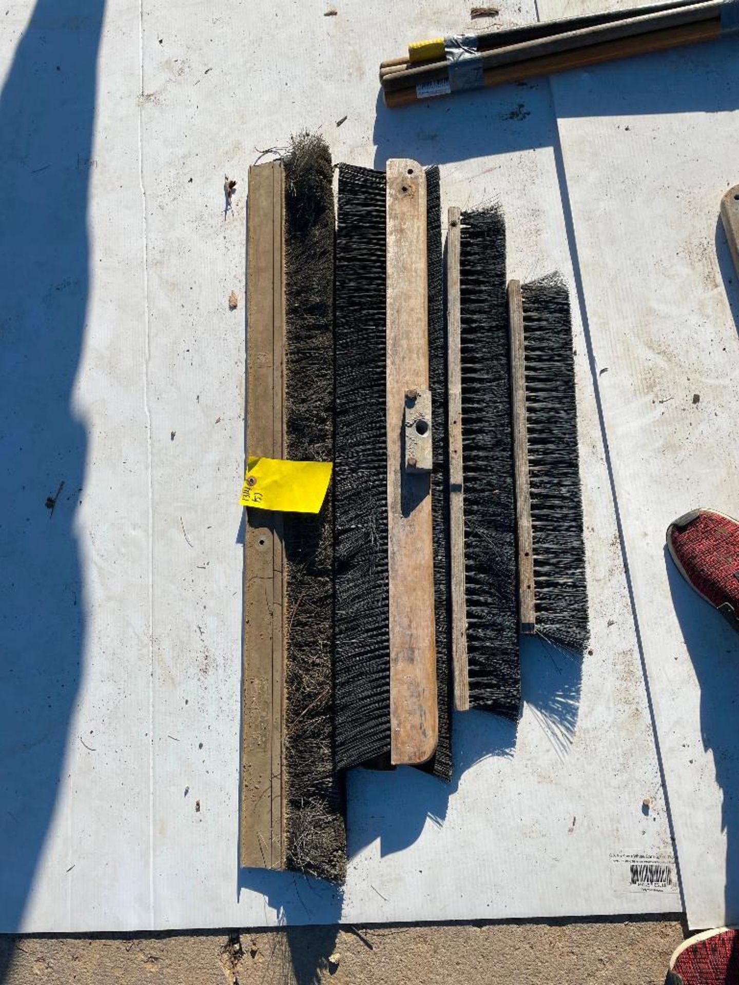 Various Size Broom Heads. Located in Hazelwood, MO