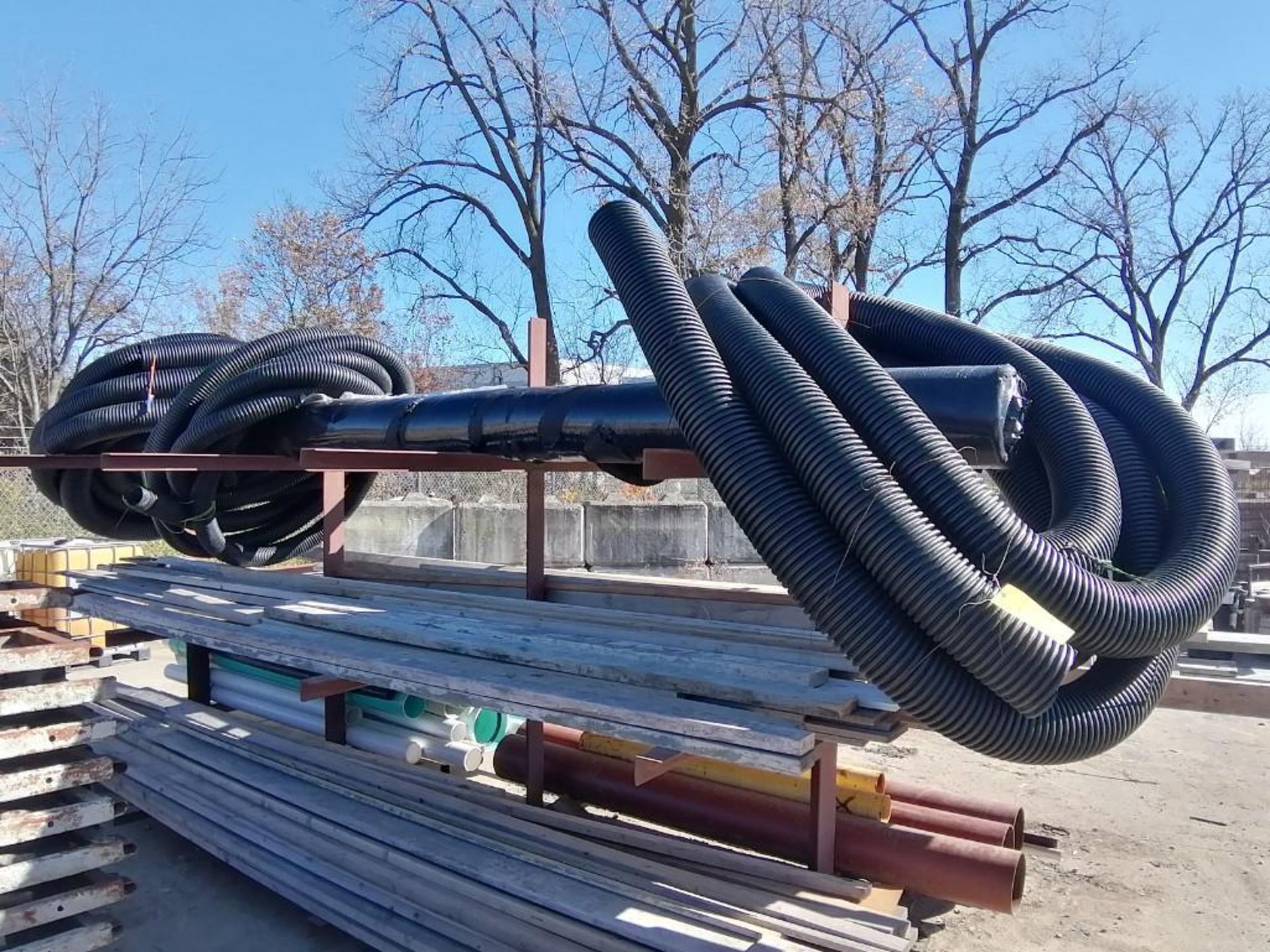 Lot of (3) Rolls of Corrugated Drainage Pipes & (1) Roll of Tencate Mirafi 140N/12.5/60. Located in