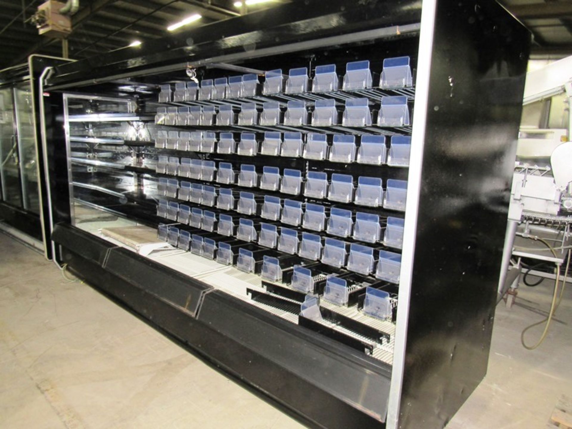 Hussman Refrigerated Reach-In Cooler, 12' long with lights, spring loaded compartments & shelves