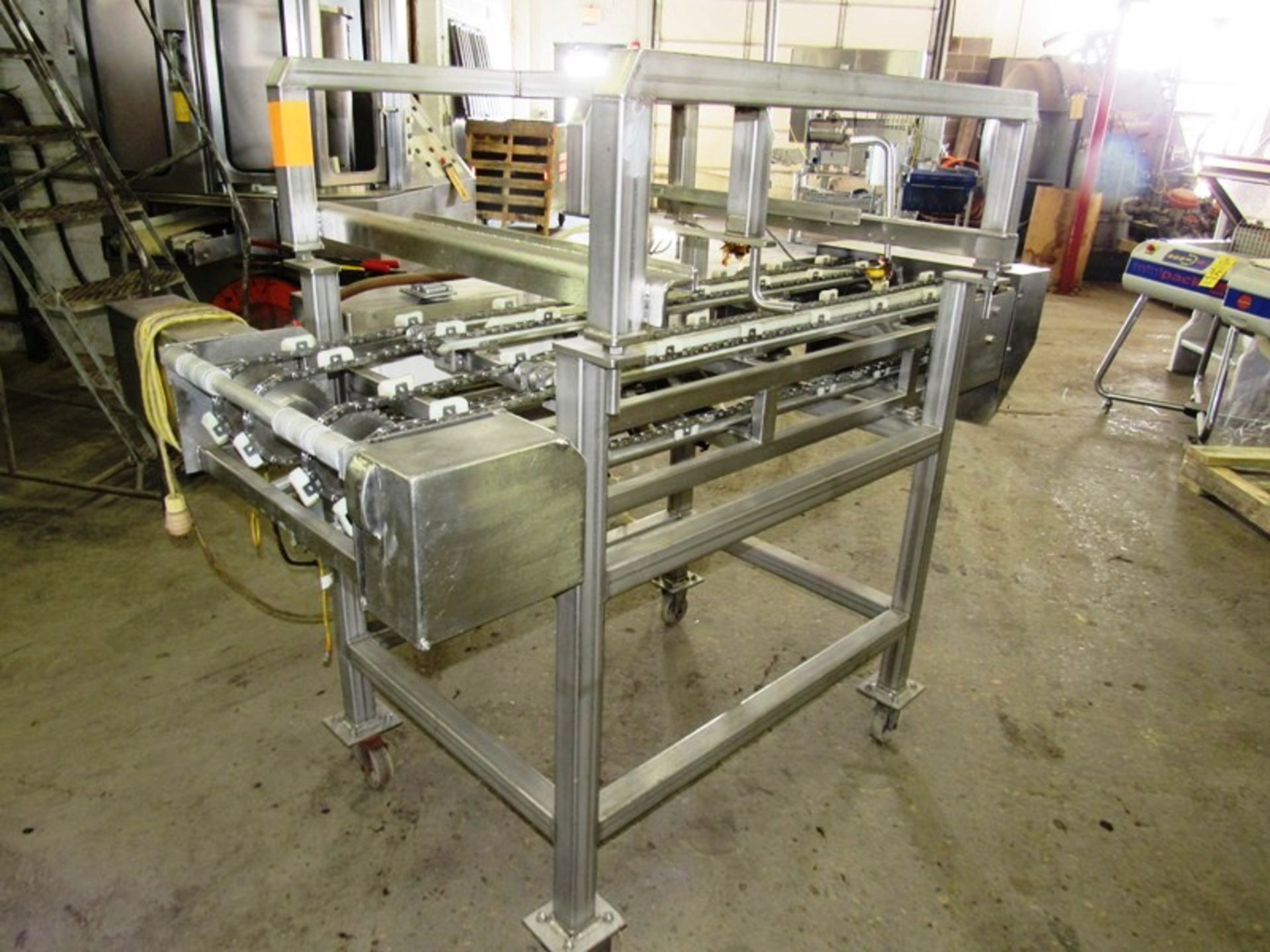 Stainless steel dual lane conveyor last used for 10” round frozen pizza transfer. 4’ wide x 6’ - Image 2 of 4