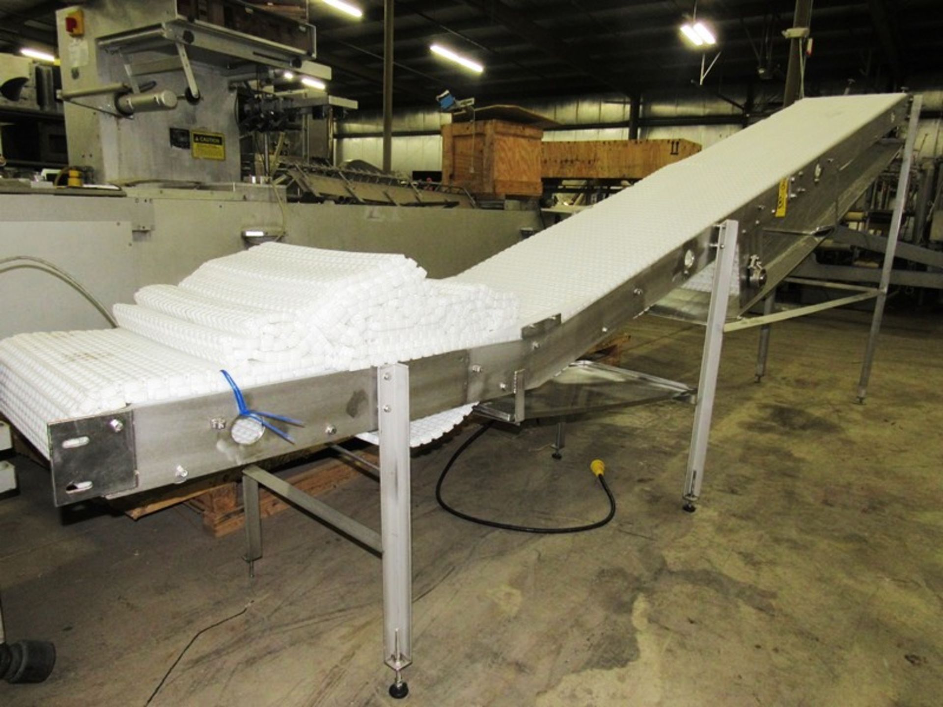 Incline Conveyor, 24" W X 17' L plastic belt, 3' high infeed, 7' discharge, stainless steel drip