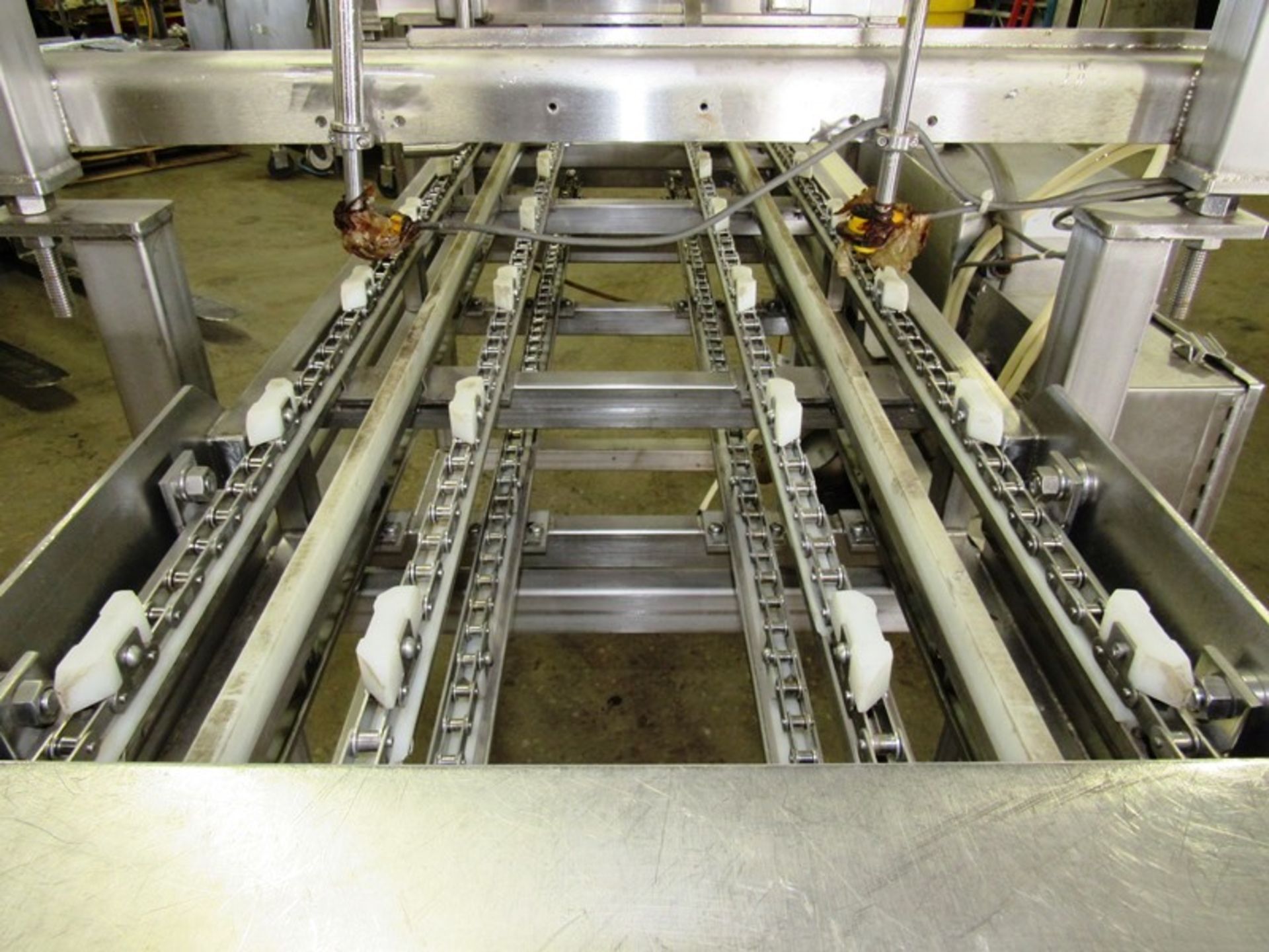 Stainless steel dual lane conveyor last used for 10” round frozen pizza transfer. 4’ wide x 6’ - Image 4 of 4