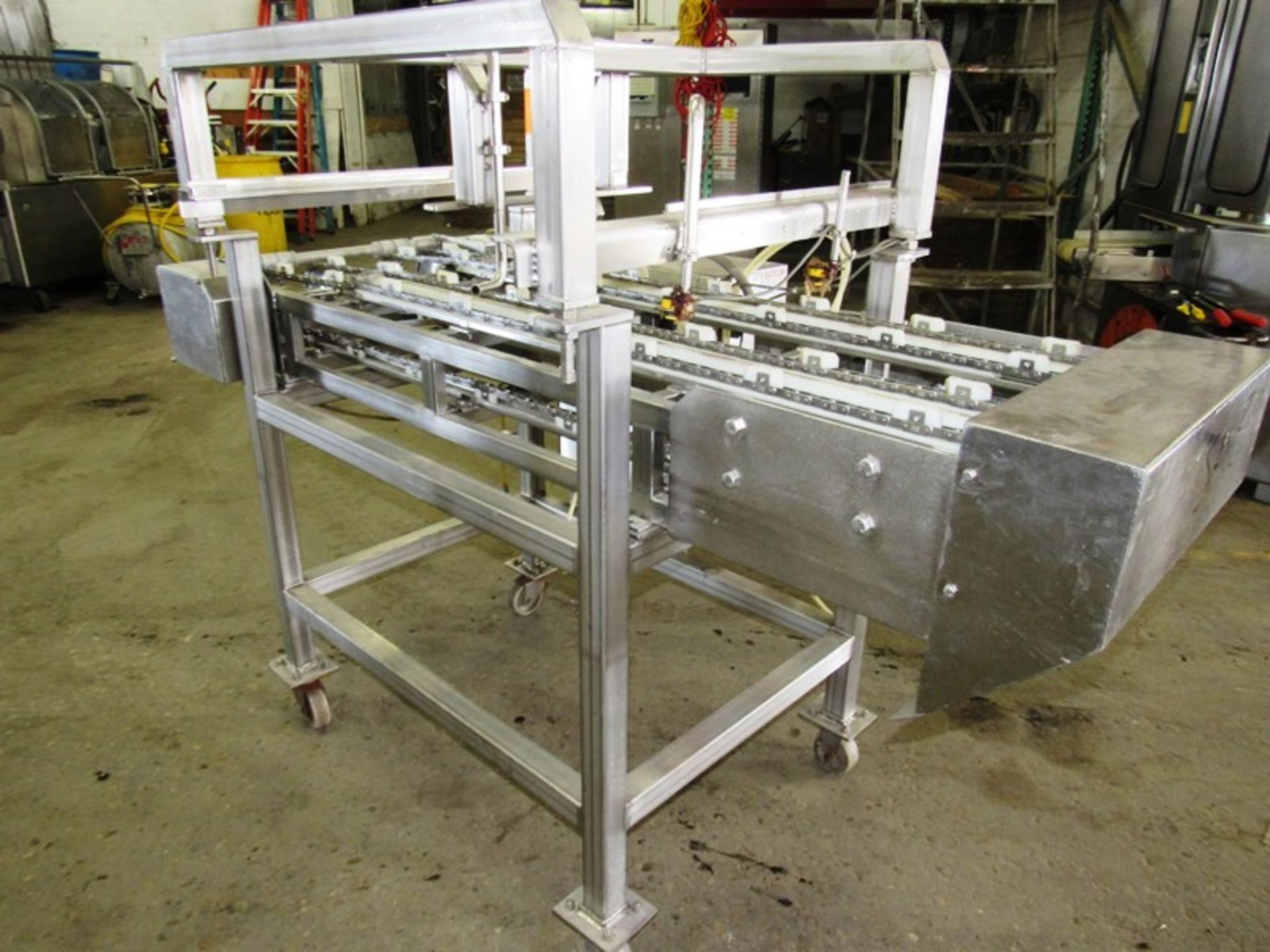 Stainless steel dual lane conveyor last used for 10” round frozen pizza transfer. 4’ wide x 6’ - Image 3 of 4