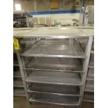 Stainless Steel Racks, 44" W X 48" L X 5' T, 6 shelves spaced 9" apart, Located in Plano,
