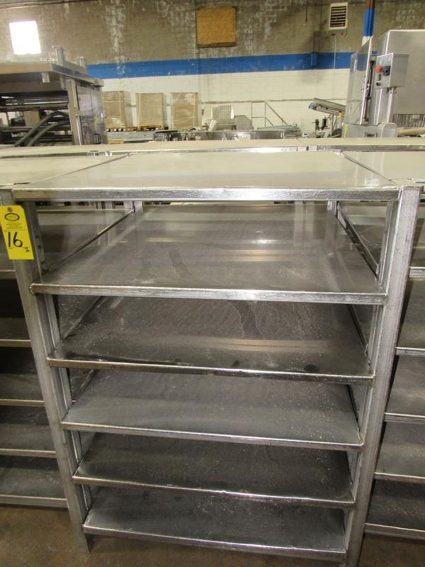 Stainless Steel Racks, 44" W X 48" L X 5' T, 6 shelves spaced 9" apart, Located in Plano,