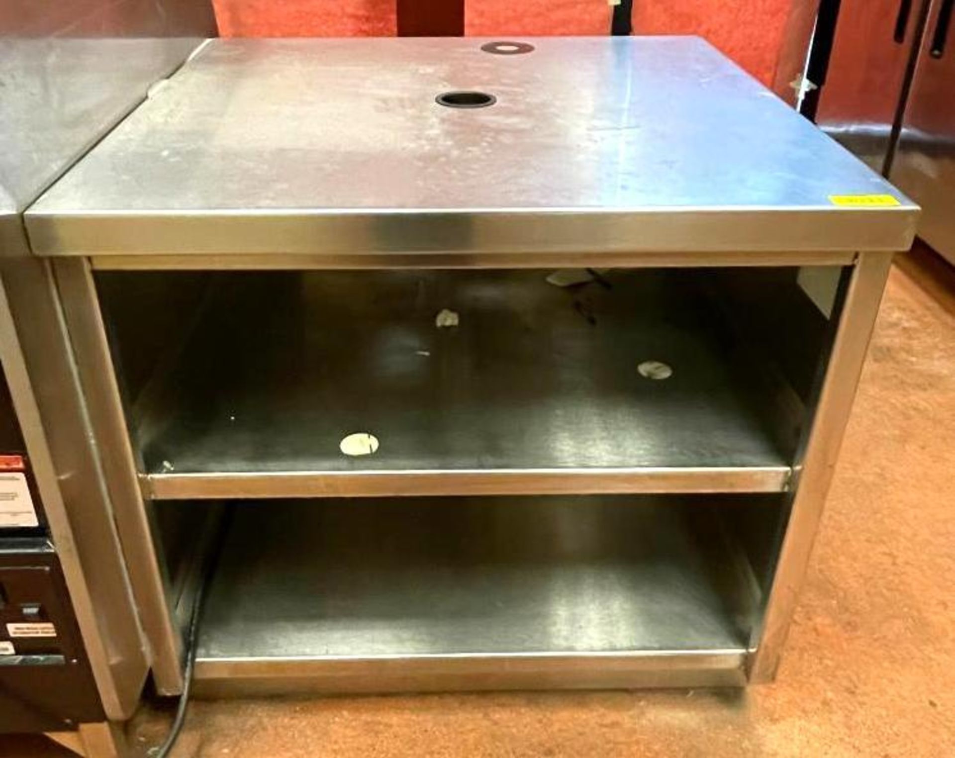 DESCRIPTION (2) 36" 2-SECTION STAINLESS RETAIL COUNTERS ADDITIONAL INFO HAS WOOD GRAIN PANEL ON THE