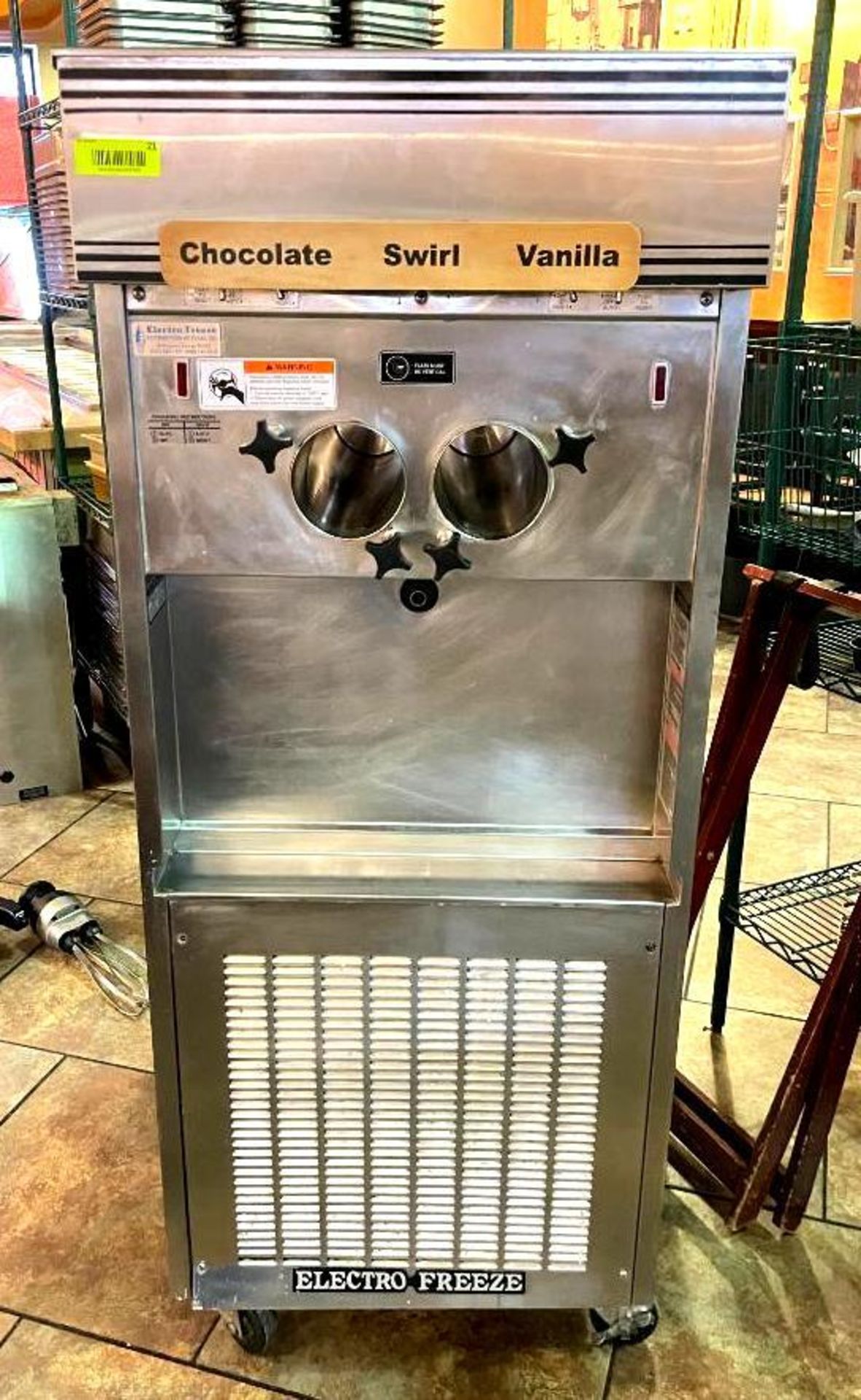 DESCRIPTION SOFT SERVE ICE CREAM MACHINE WITH 2-FLAVOR OPTIONS AND A SWIRL OPTION BRAND/MODEL ELECTR