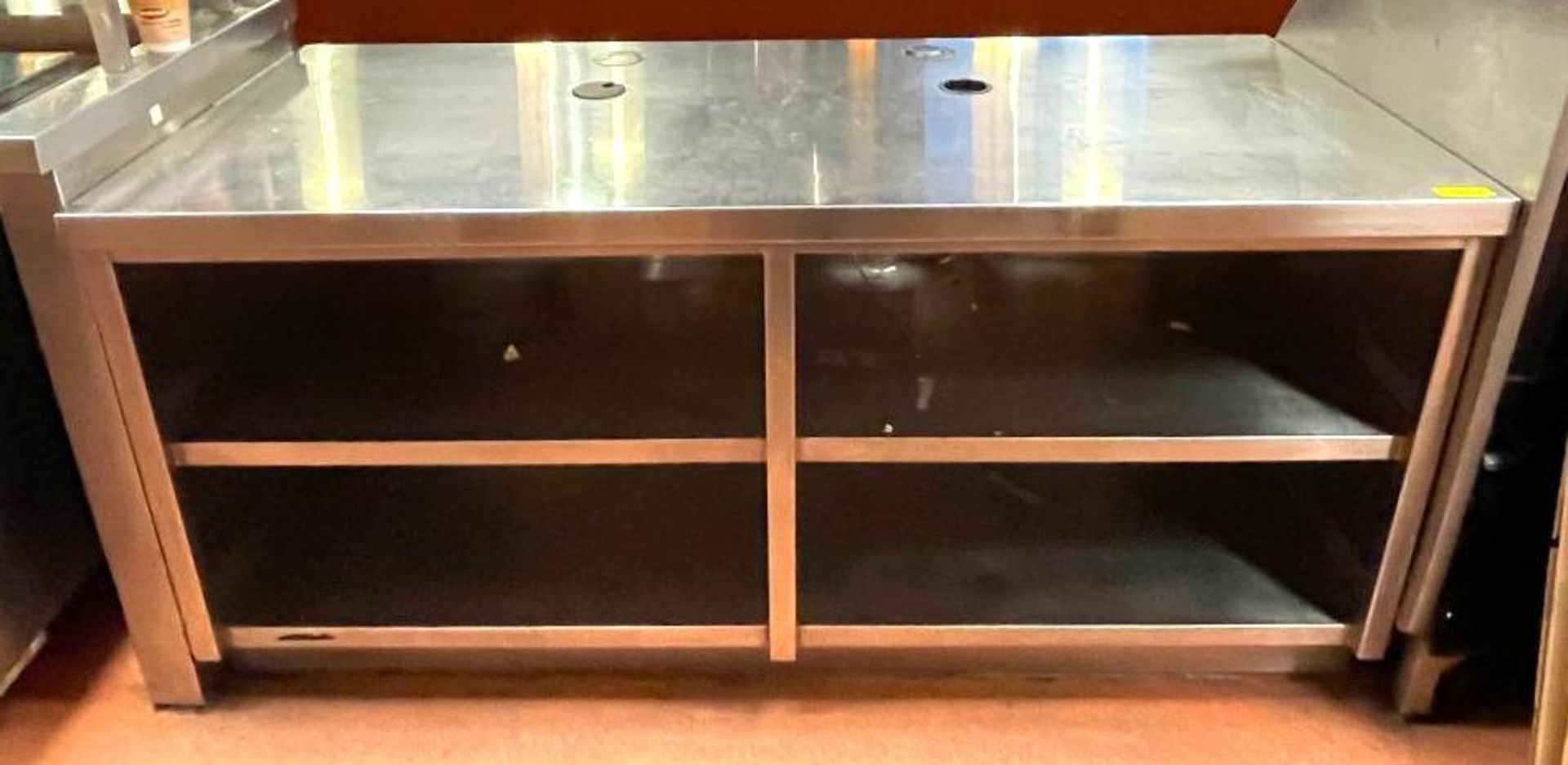 DESCRIPTION 6' 4-SECTION STAINLESS RETAIL COUNTER ADDITIONAL INFO HAS WOOD GRAIN PANEL ON THE FRONT