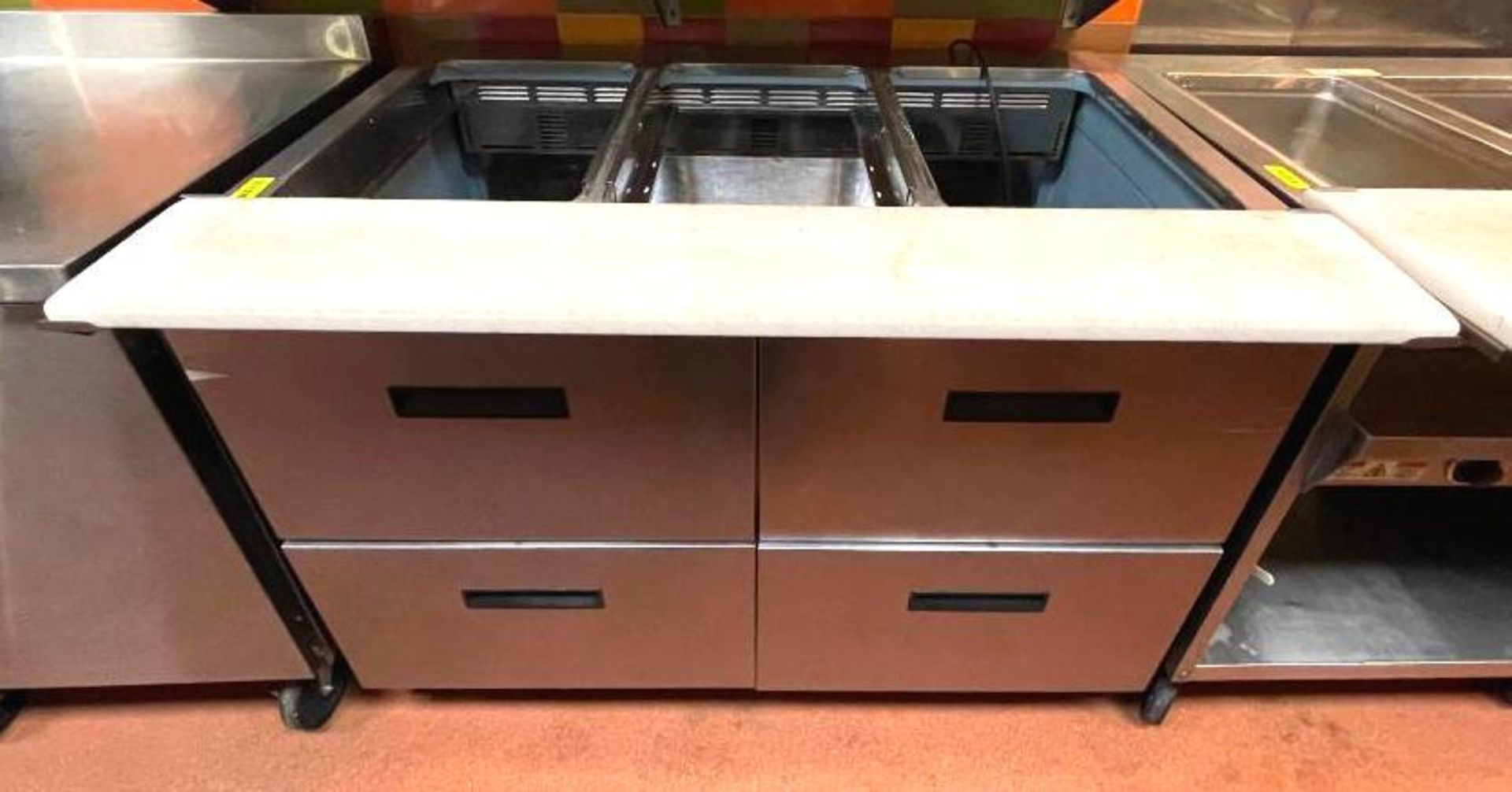 DESCRIPTION 4-DRAWER REFRIGERATED SANDWICH PREP TABLE WITH 3-WELLS (NO COVER) BRAND/MODEL DELFIELD D