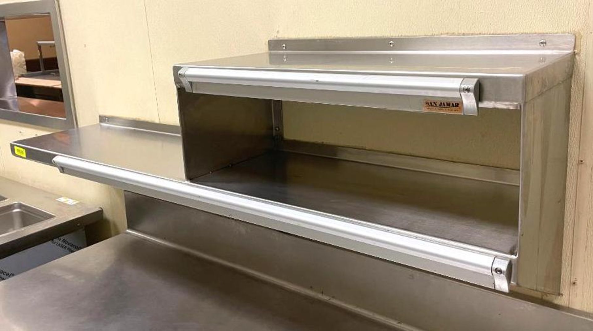 DESCRIPTION 5' WALL MOUNT STAINLESS SHELF WITH HALF RISER AND TICKET HOLDER SIZE 60"X12" QUANTITY: X