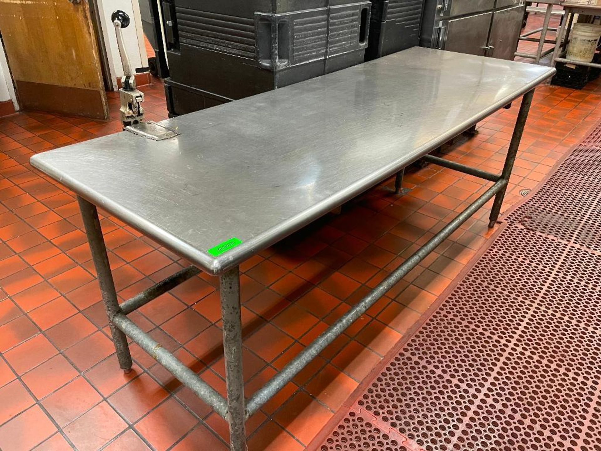 DESCRIPTION: 8' X 30" STAINLESS TABLE W/ MOUNTED CAN OPENER SIZE: 8' LOCATION: KITCHEN QTY: 1