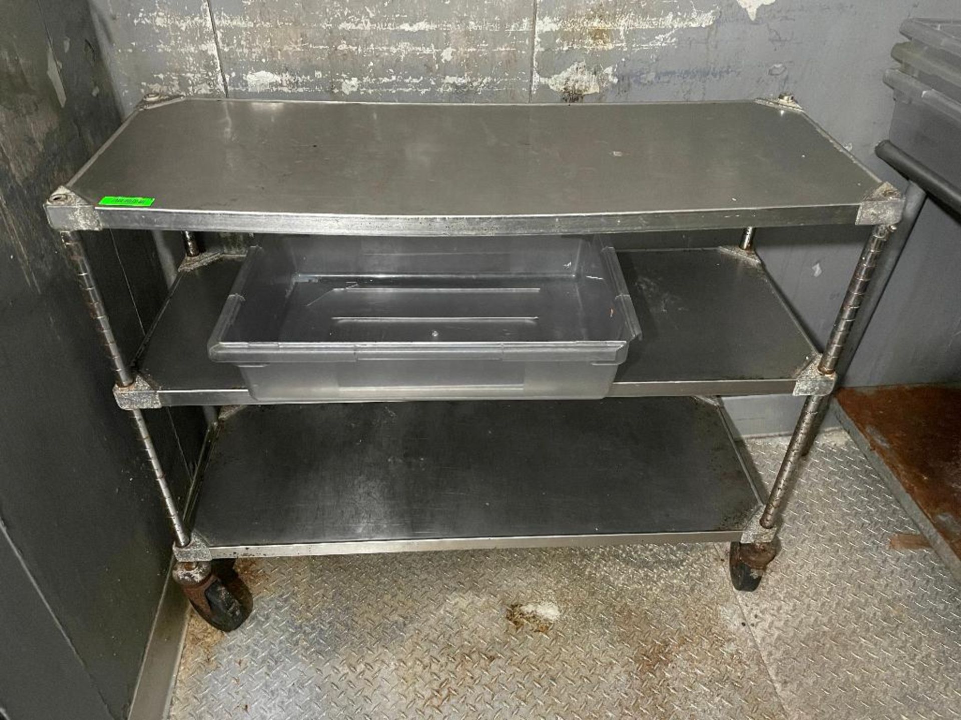 DESCRIPTION: 48" X 28" THREE TIER STAINLESS TABLE SIZE: 48" LOCATION: WALK IN QTY: 1