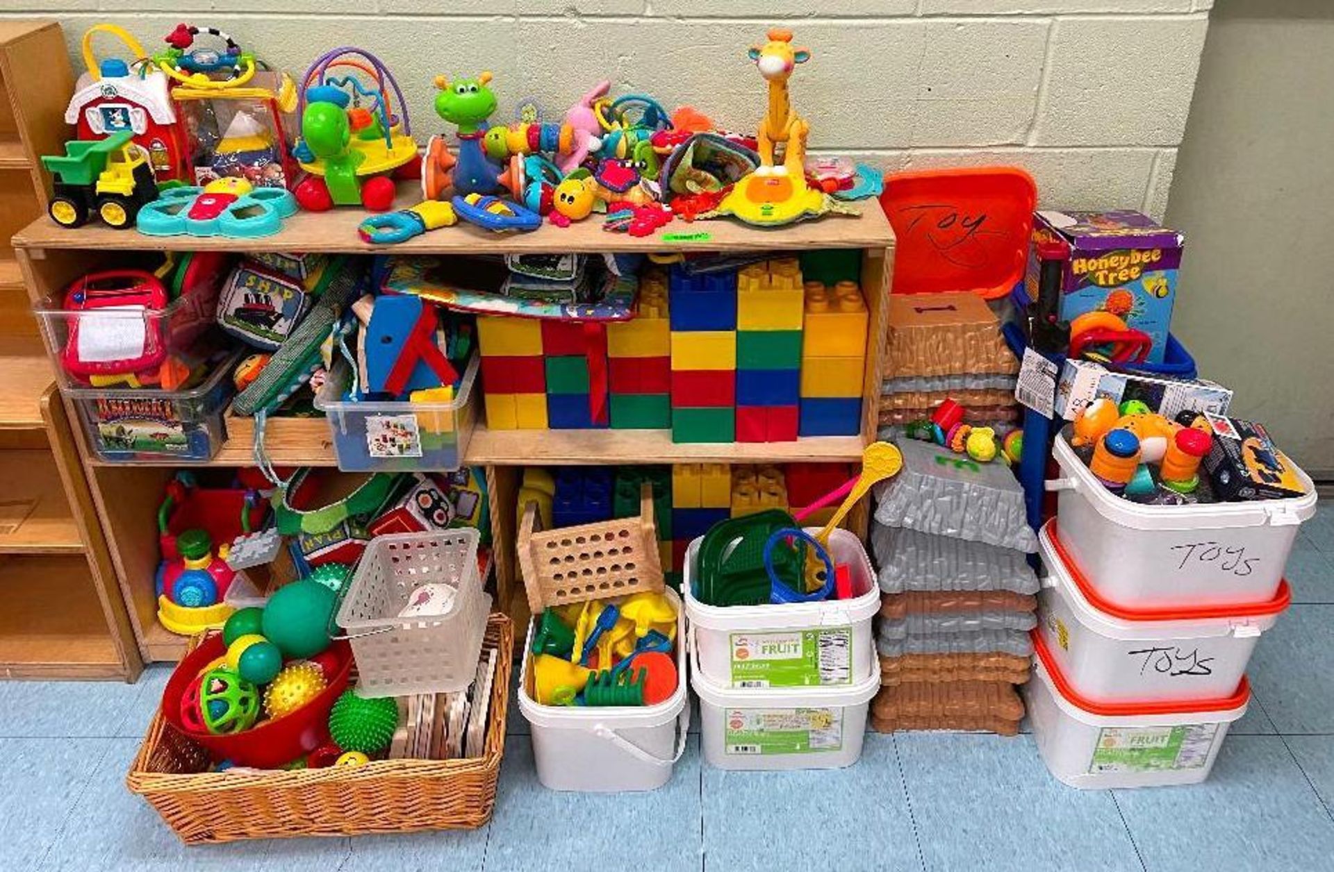DESCRIPTION LARGE ASSORTMENT OF CHILDRENS TOYS AS SHOWN LOCATION 137 THIS LOT IS ONE MONEY QUANTITY