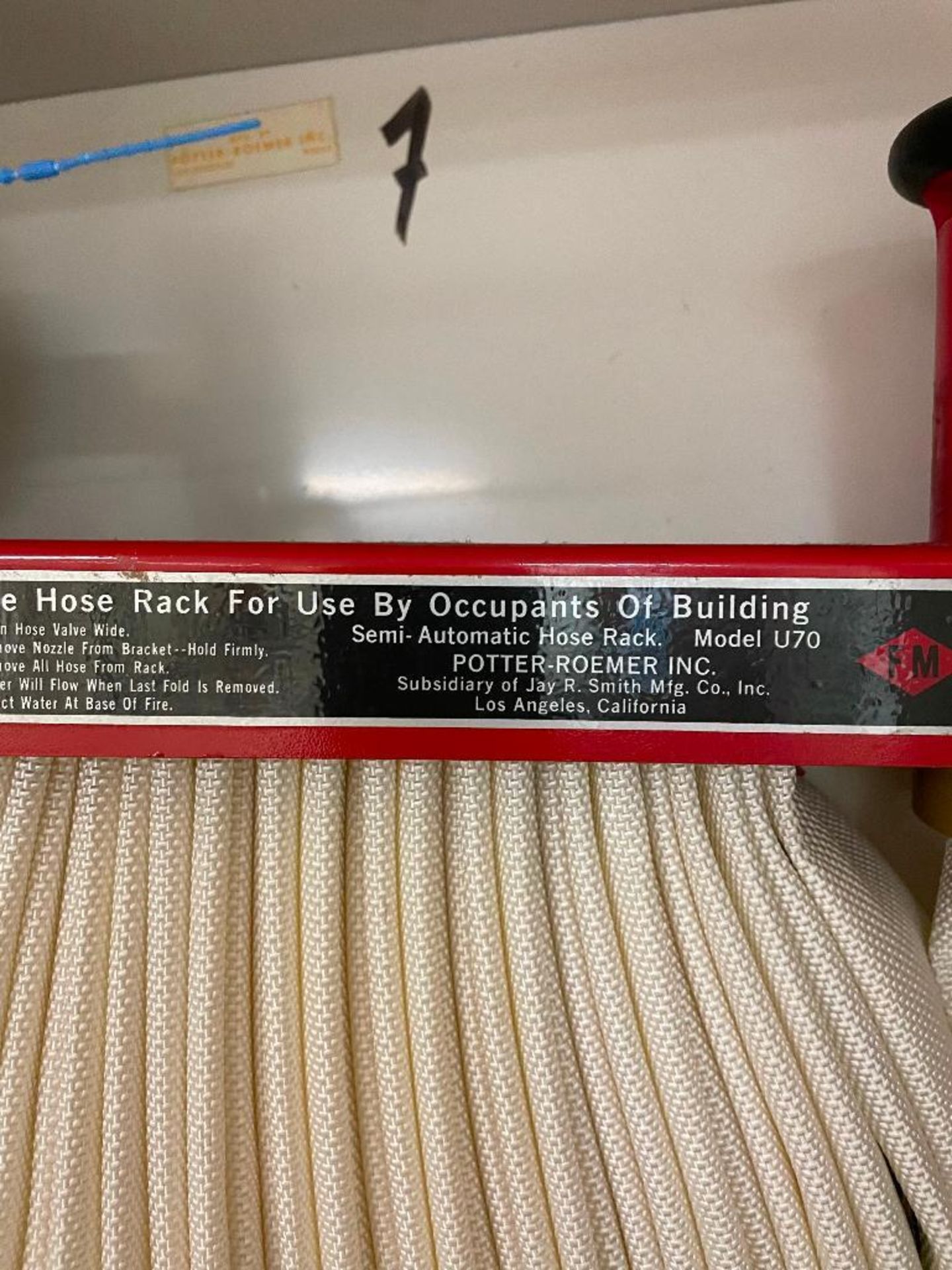 DESCRIPTION EMERGENCY FIRE HOSE W/ RACK & EXTINGUISHER (RACK & HOSE ONLY, VALVE NOT INCLUDED) LOCATI - Image 4 of 5