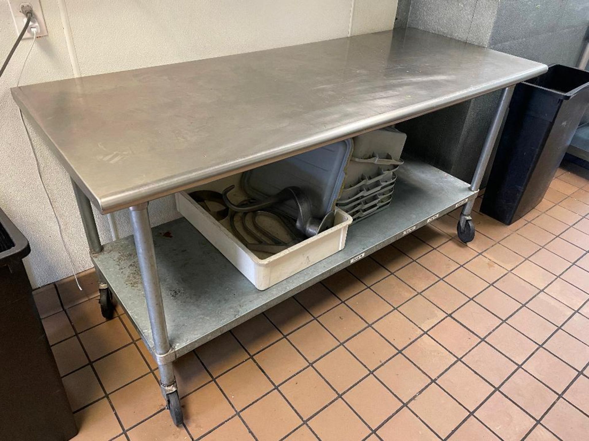 DESCRIPTION: 72" X 30" STAINLESS TABLE W/ GALV UNDER SHELF AND CASTERS. ADDITIONAL INFORMATION NO CO