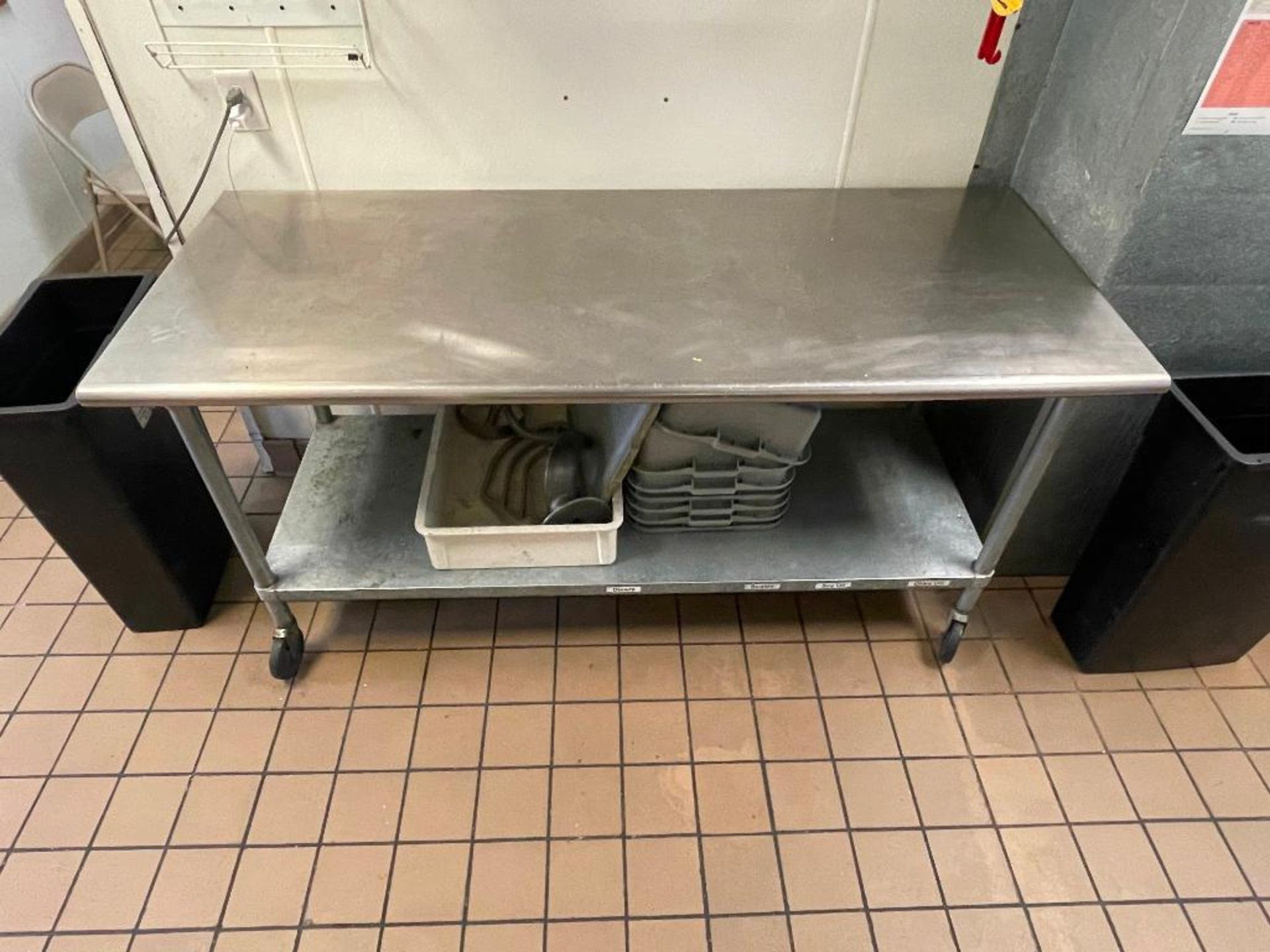 DESCRIPTION: 72" X 30" STAINLESS TABLE W/ GALV UNDER SHELF AND CASTERS. ADDITIONAL INFORMATION NO CO - Image 2 of 3