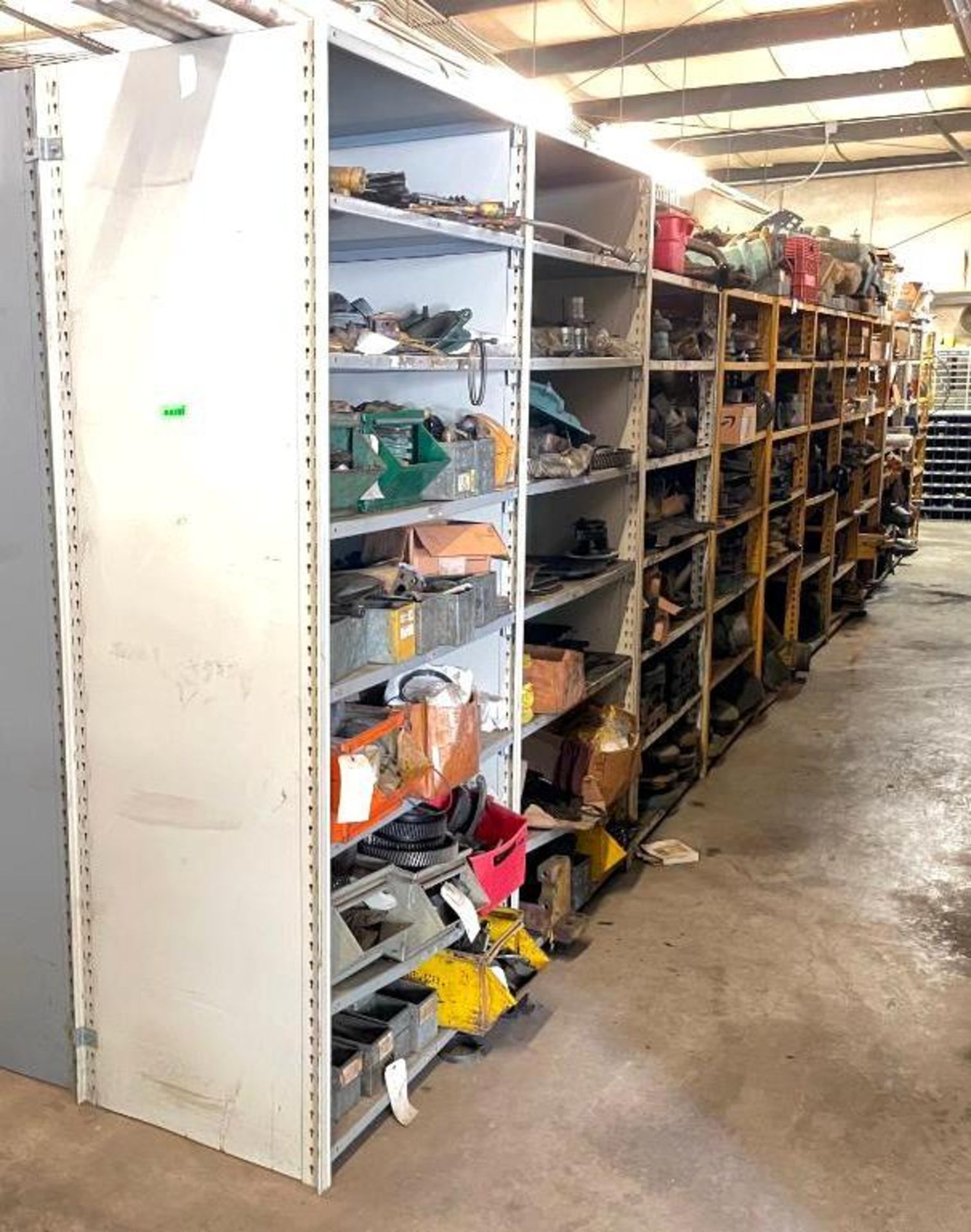 SHELVING UNITS WITH LARGE AMOUNT OF AUTOMOTIVE AND HEAVY MACHINERY PARTS AS SHOWN ADDITIONAL INFO SE