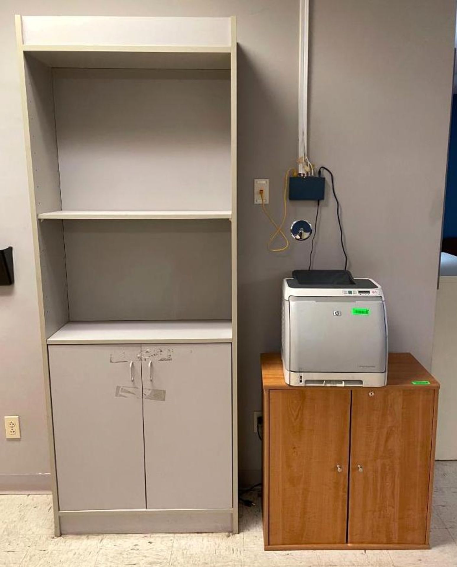 (2) OFFICE CABINETS LOCATION RECEPTION THIS LOT IS ONE MONEY QUANTITY: X BID 1