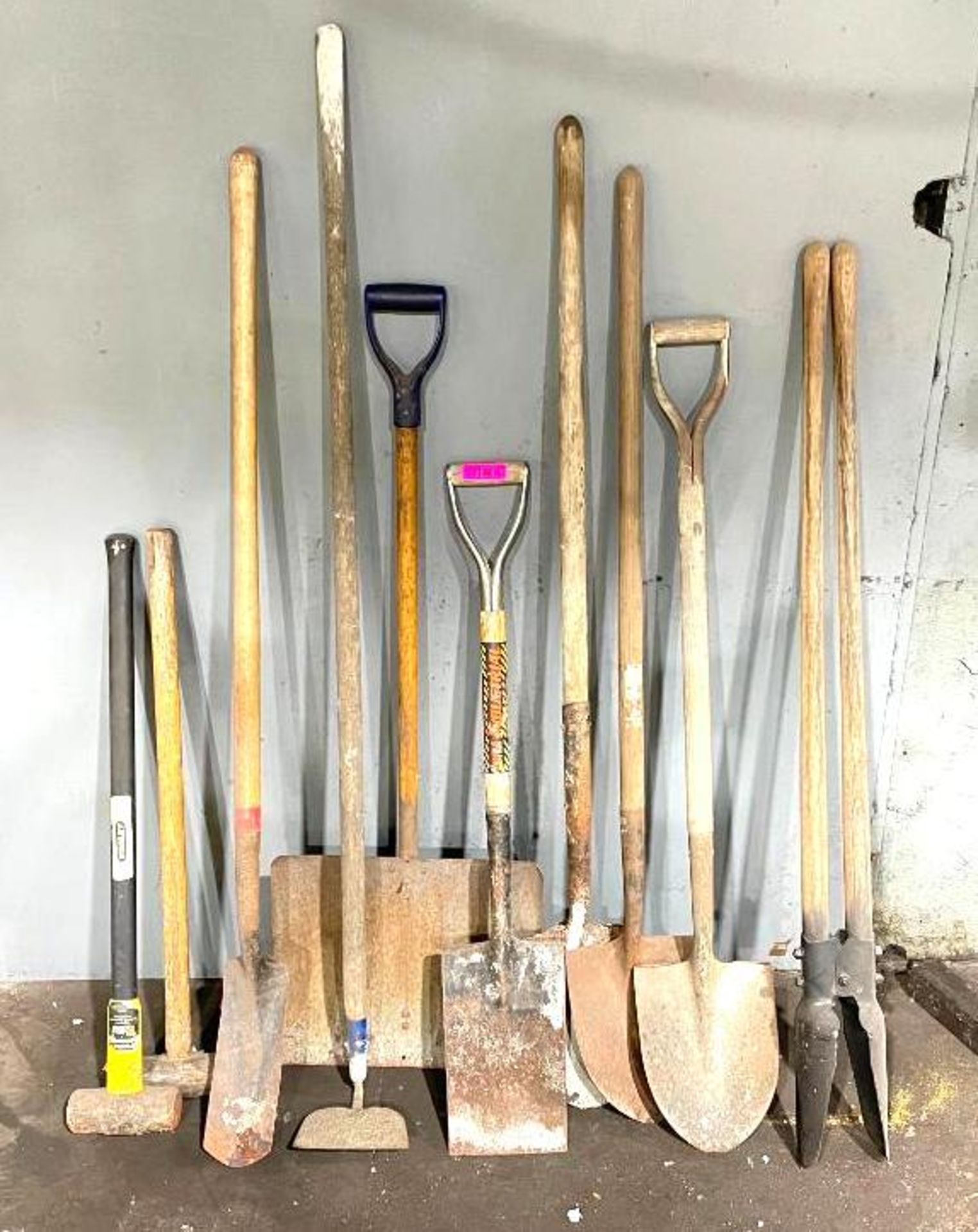 DESCRIPTION ASSORTED SHOVELS & HAND TOOLS AS SHOWN THIS LOT IS ONE MONEY QUANTITY 1 ASSORTED SHOVELS