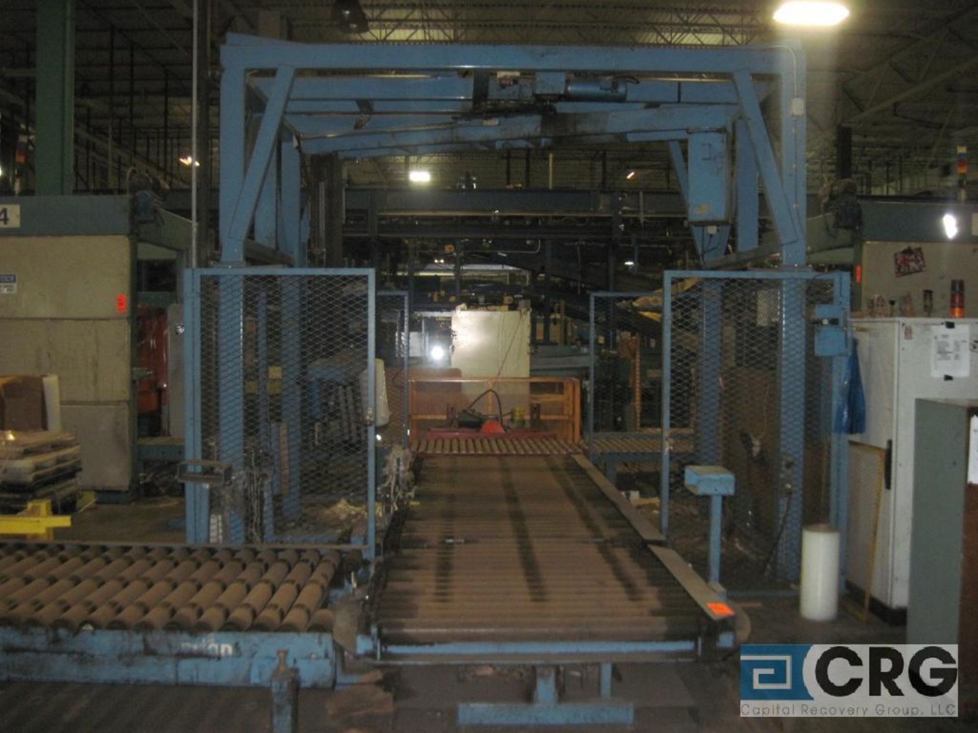 Orion MA44 automatic rotary pallet stretch wrapper with auto index in and out feed conveyor Sn: