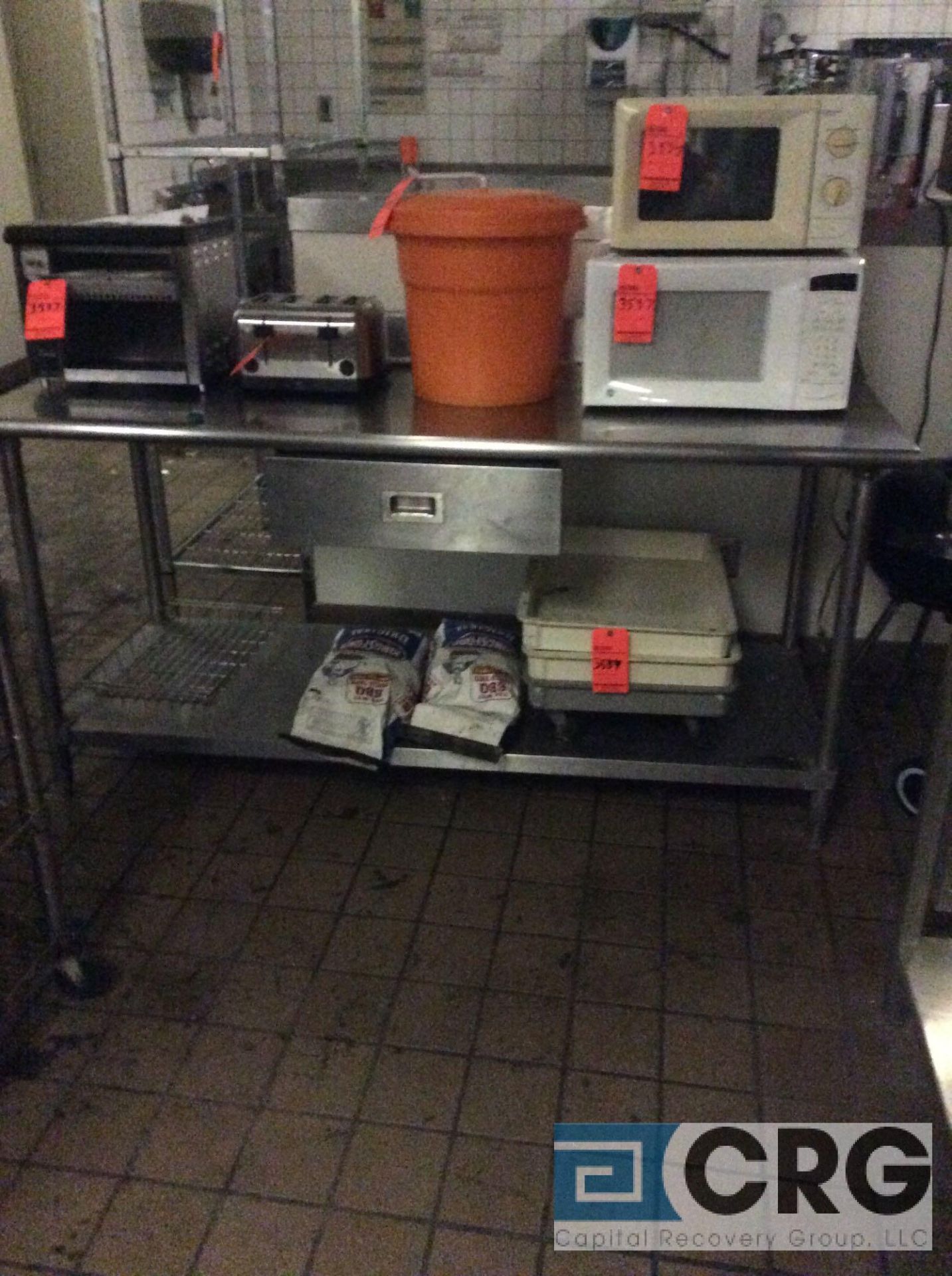 lot of 3 assorted ss kitchen prep tables, no contents. ( one is under toaster lot 3537, one is under