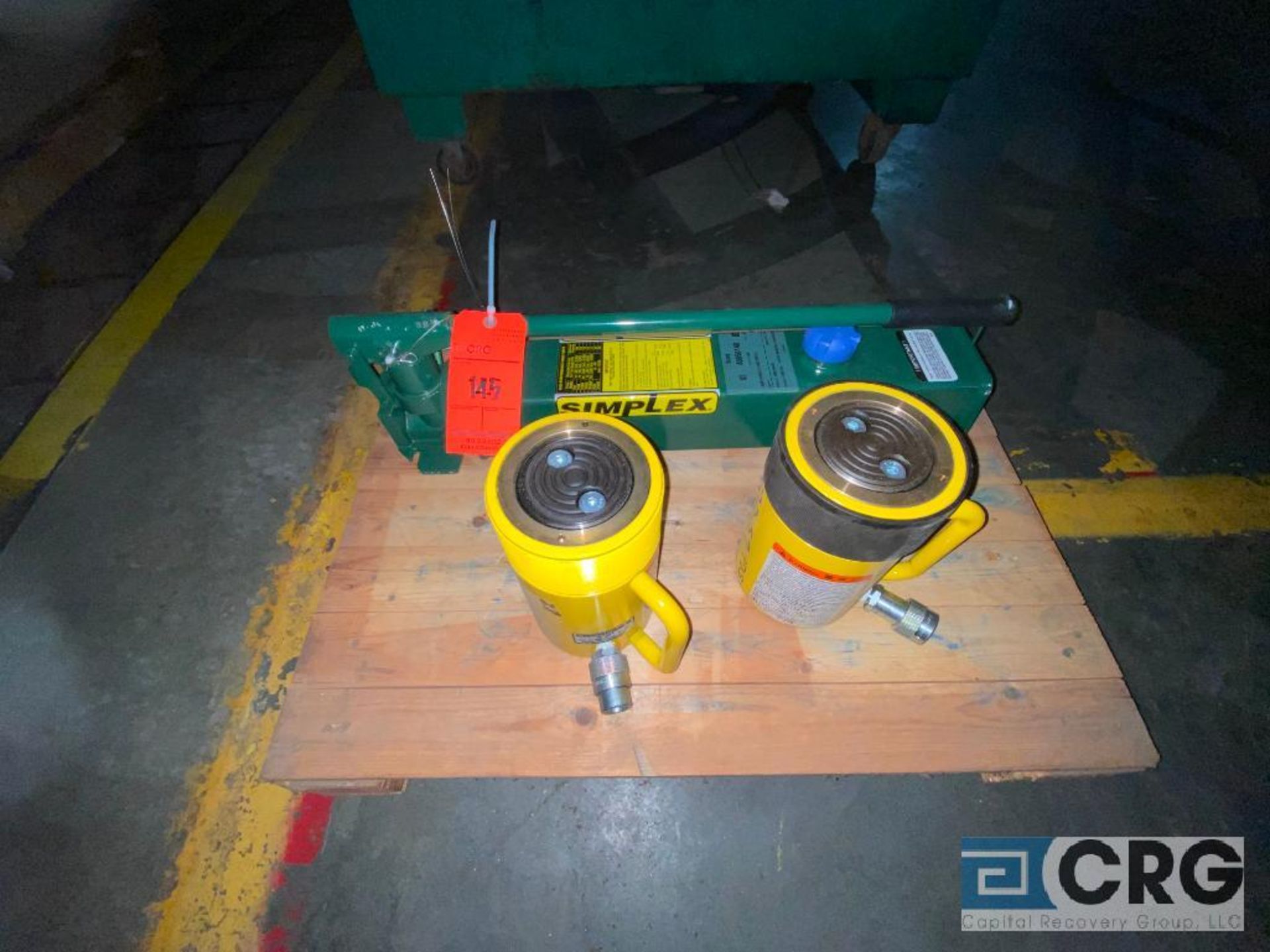 Simplex hydraulic pump, with (2) enerpac 50 ton jacks (Location: Finished Warehouse)