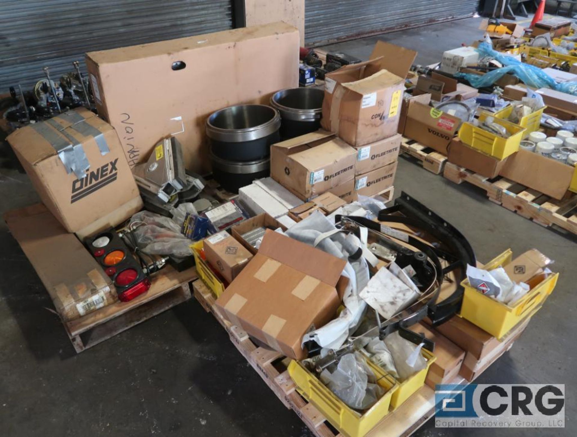 Lot of (3) pallets of International assorted parts including brake drum, radiator, fuel tank