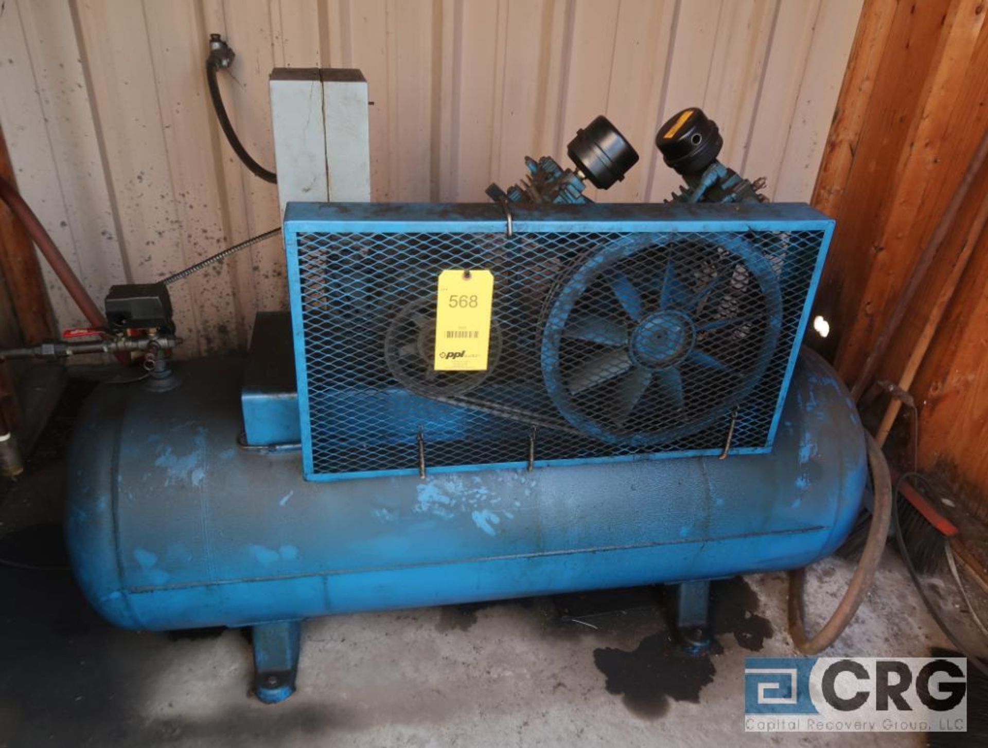 EMQLO horizontal air compressor, 5 HP motor, 200 psi, located outside in shed (Maintenance Shop)